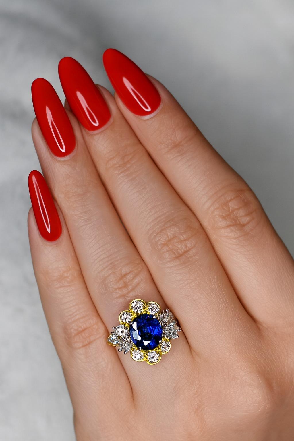 Magnificent Vintage 1980s Burma Mogok Royal Blue Sapphire and Diamond Cocktail Ring

A remarkable vintage treasure from the 1980s, this cocktail ring showcases an exceptionally rare Royal Blue sapphire from Burma’s famed Mogok mines, weighing an