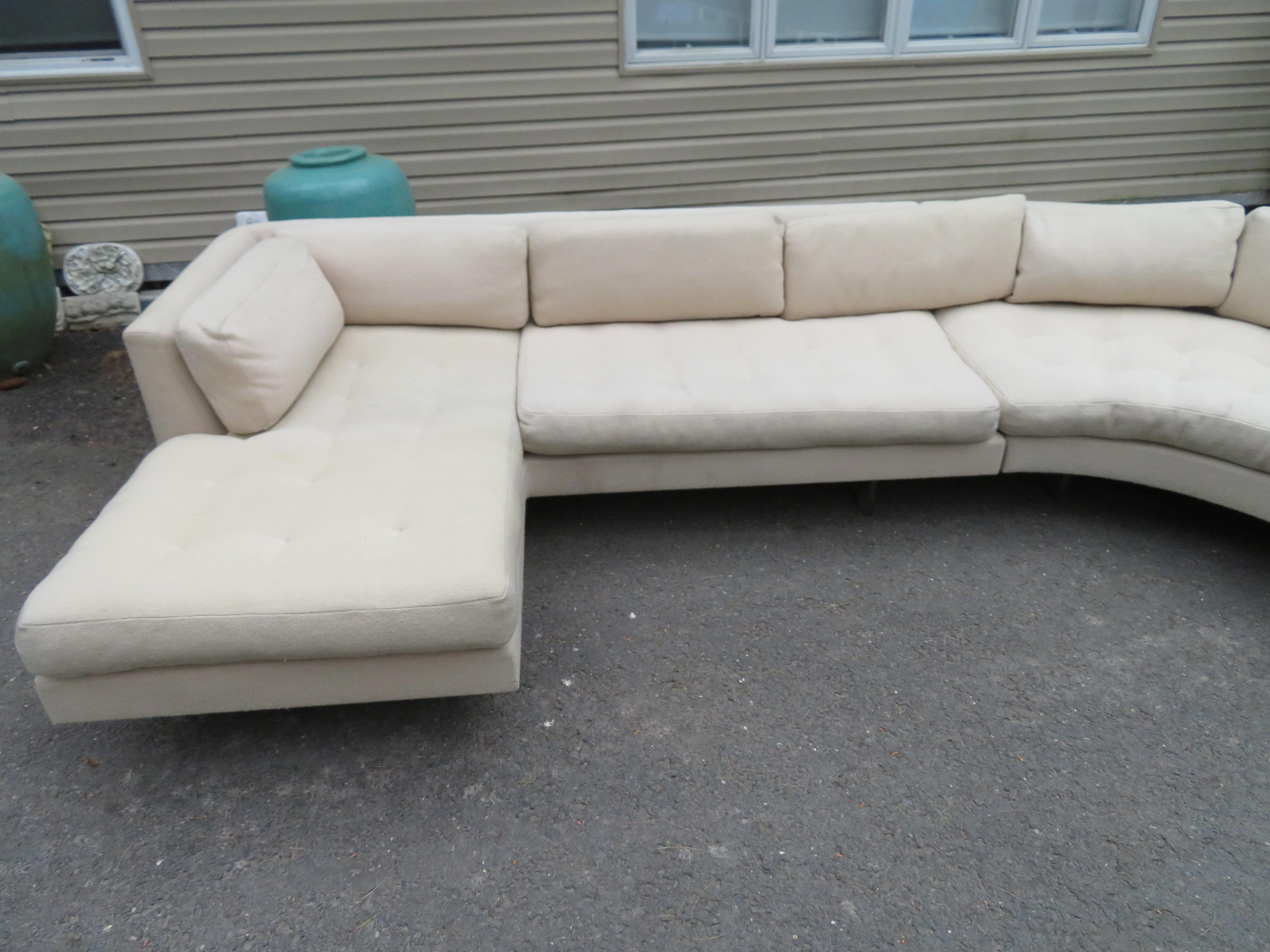 Stunning 3 piece Vladimir Kagan Design Omnibus sofa sectional. This sectional retains its original fabric and will need to be reupholstered as the fabric is worn and dated. Fully supported on Kagan’s trademark lucite bases, giving the sofa a