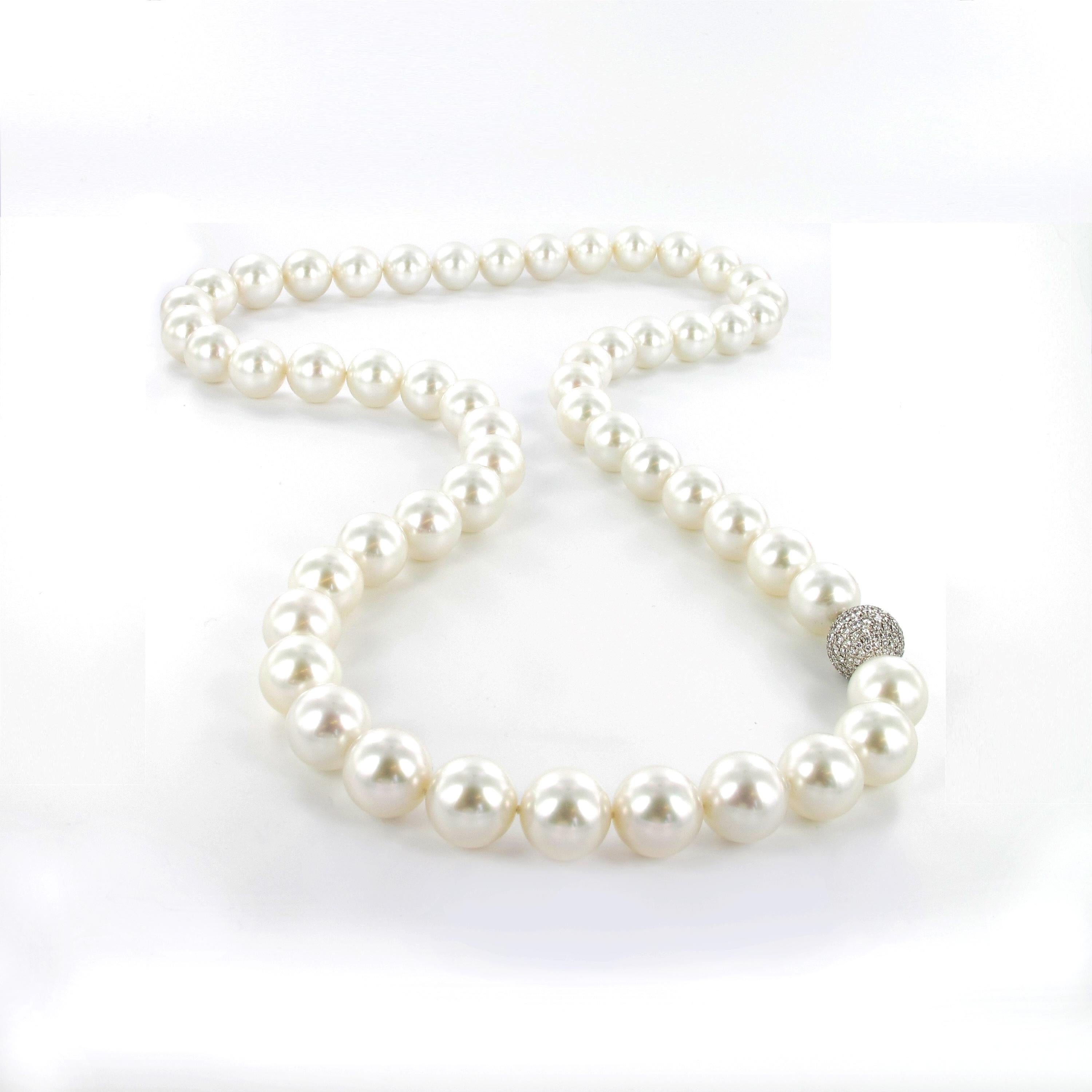 Very fine South Sea cultured pearl necklace composed of fifty-three perfectly round pearls graduated from 14.95 to 17.60mm. The beads are of white bodycolour with no gray or cream shades but added with light, attractive pink overtones. 80% of the