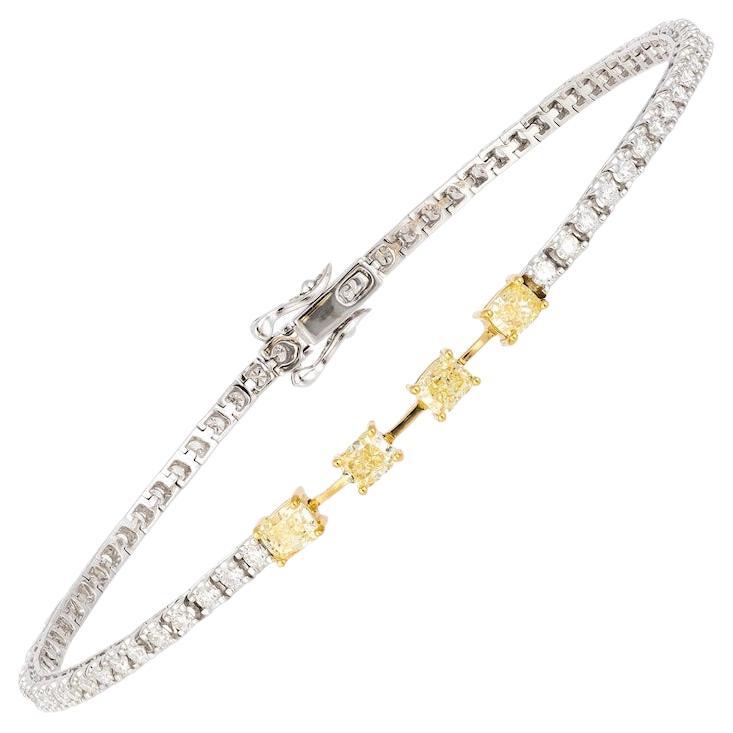 Magnifique bracelet tennis en or blanc et diamants jaunes, bijouterie fine