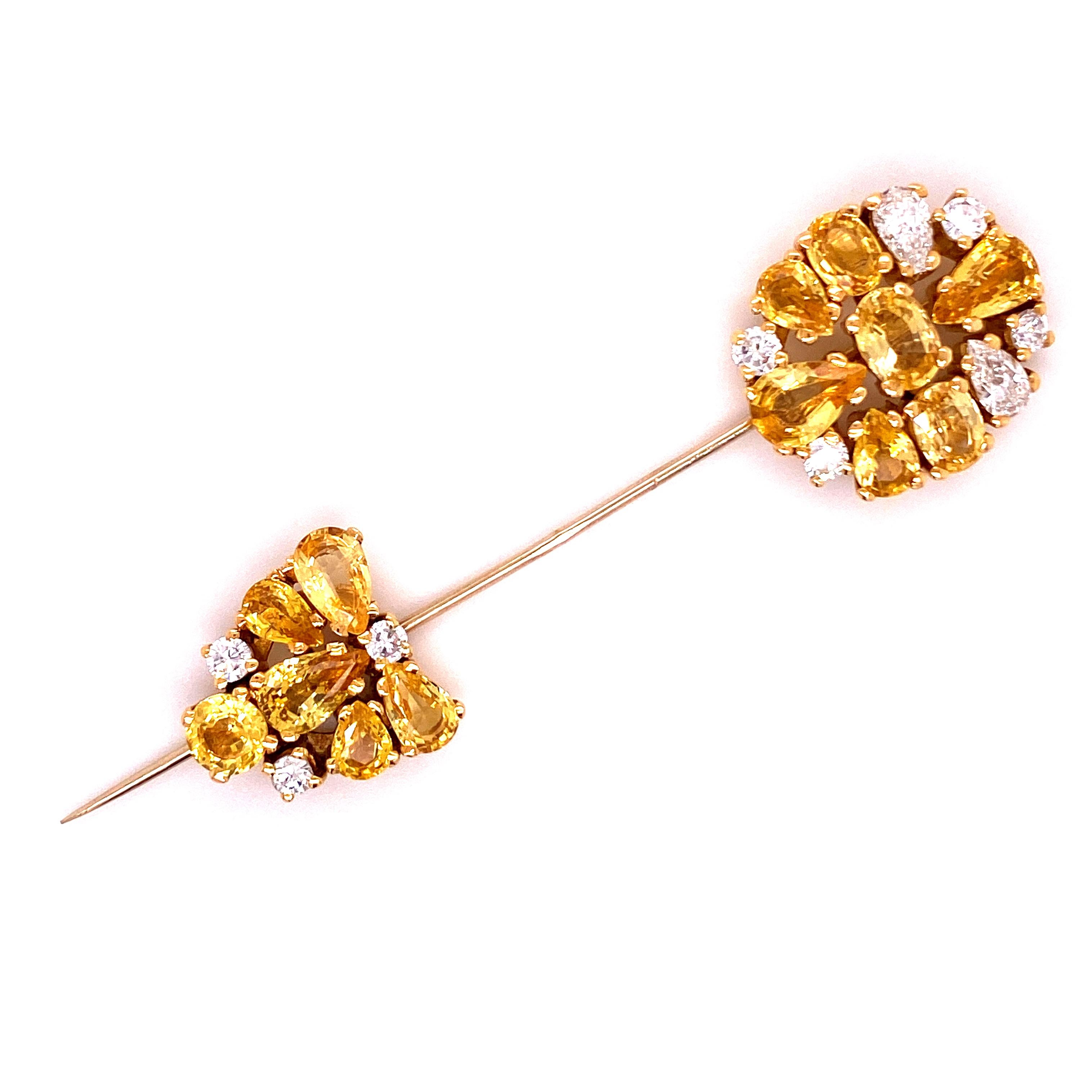 This pin is the perfect companion for a festive appearance. The different cuts of the yellow sapphires and diamonds are beautifully arranged - they harmonize perfectly with the yellow gold setting which is worked in 18 k yellow gold. 13 yellow