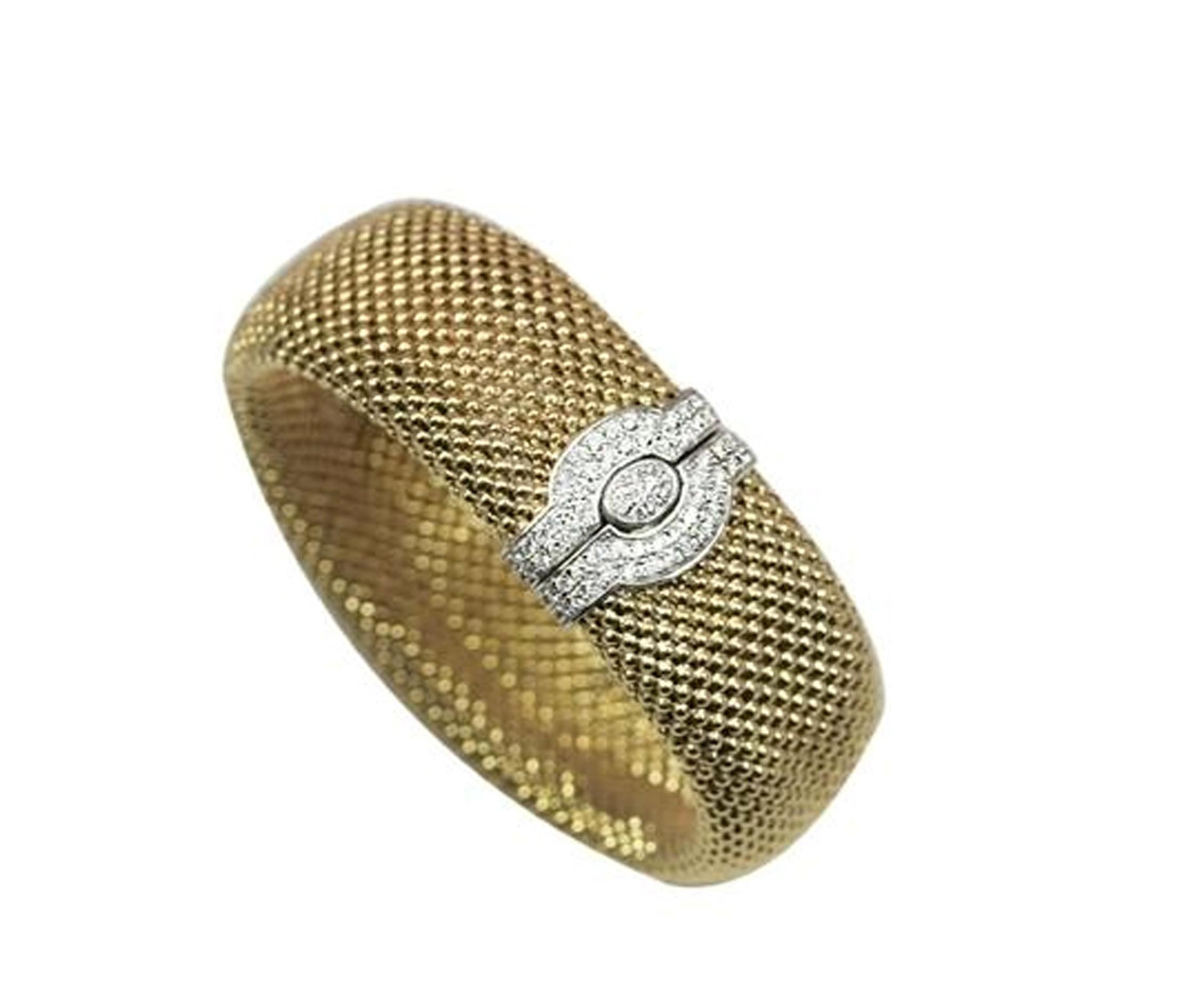 14karat Yellow Gold Flexible Wide Mesh Bracelet with White Diamond Pave Clasp 
 Handmade 14kt Yellow Gold flexible beaded mesh bracelet
Weighing 37.3 grams with a unique 14k.white gold  clasp containing 1.00ct pave set diamonds,VS2 clarity G-H