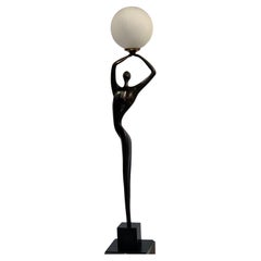 Magnifique lampe "Venus" en bronze et verre poli