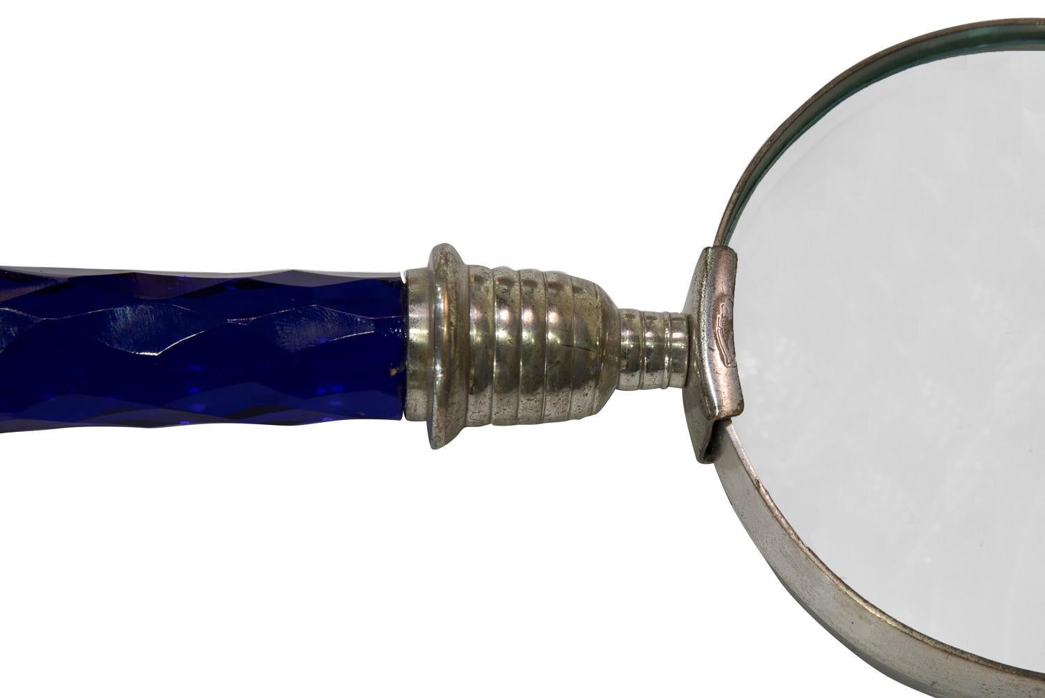 Late 20th century magnifying glass with faceted bristol blue glass handle.