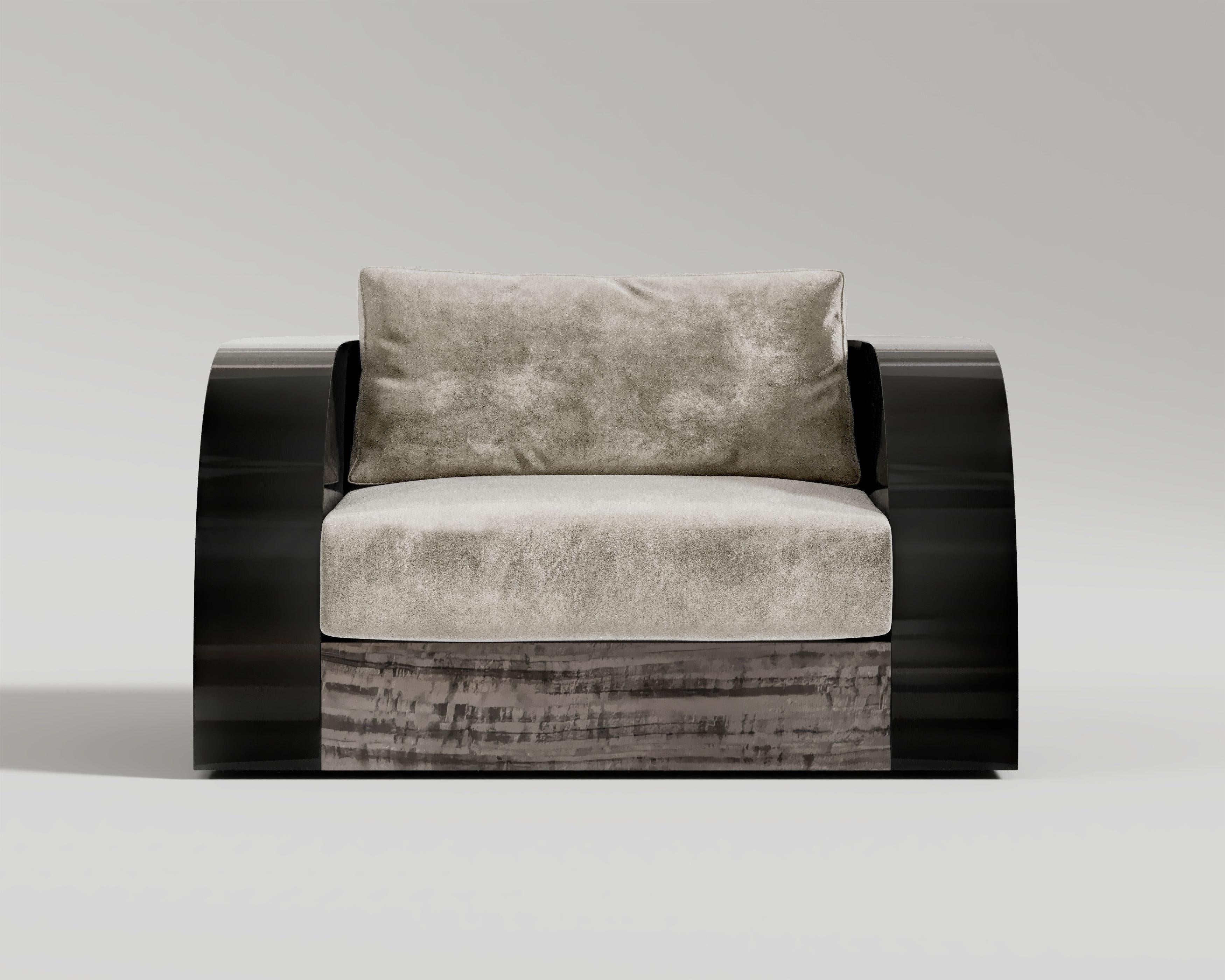 Magno  Sofa 

Adorned with a beautiful black lacquer frame and eucalyptus base, the Magno Lounge Chair is an example of the art and hard work of the craftsmen. This chair stands out in the beauty of its shape and looks fantastic in beautiful