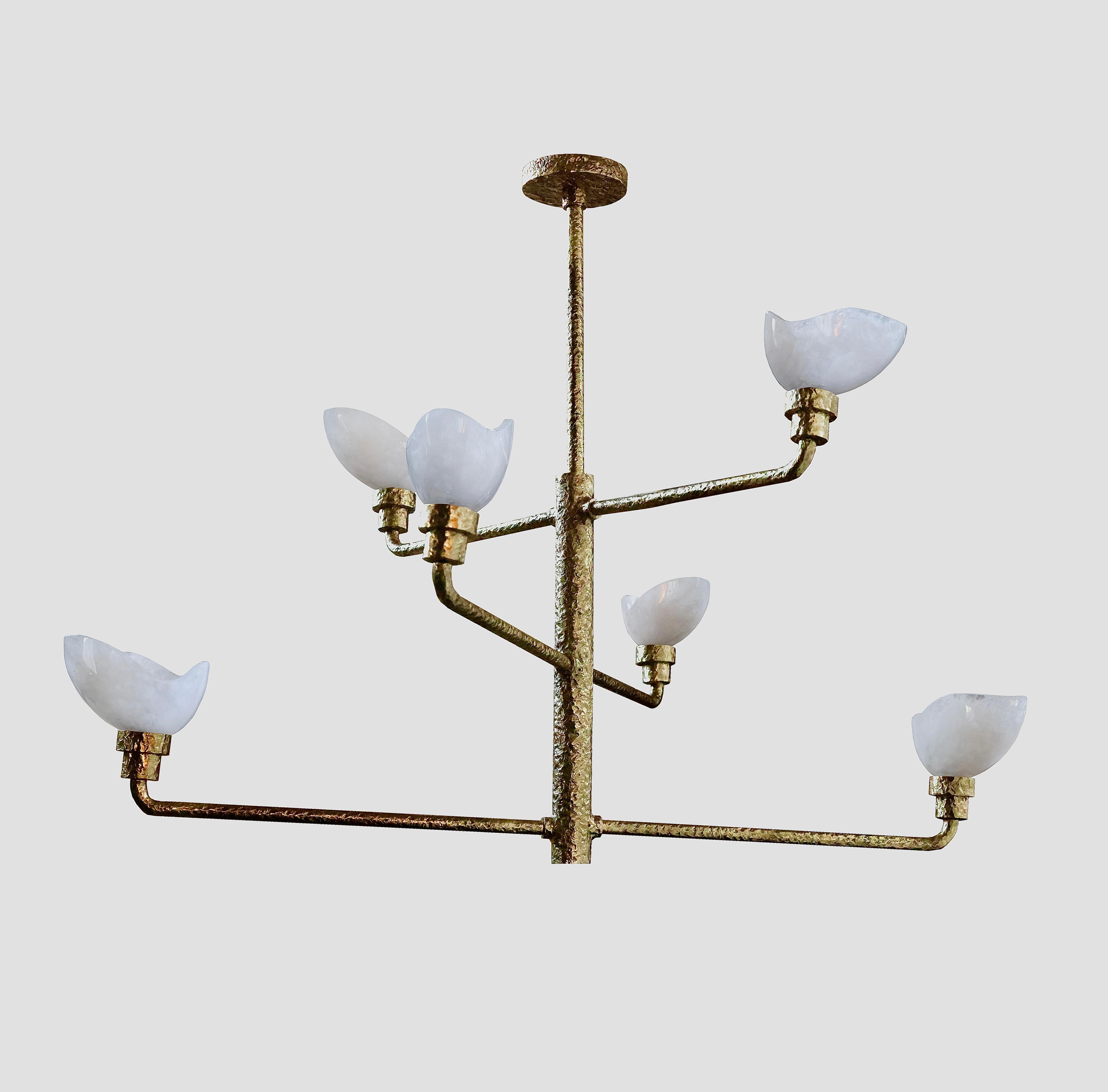 Hammered polished brass frame with finely carved rock crystal petals.
Created by Phoenix
Available finish:polished nickel,aged brass and plaster 
Six E12 sockets installed,600w total 

Custom size upon request.