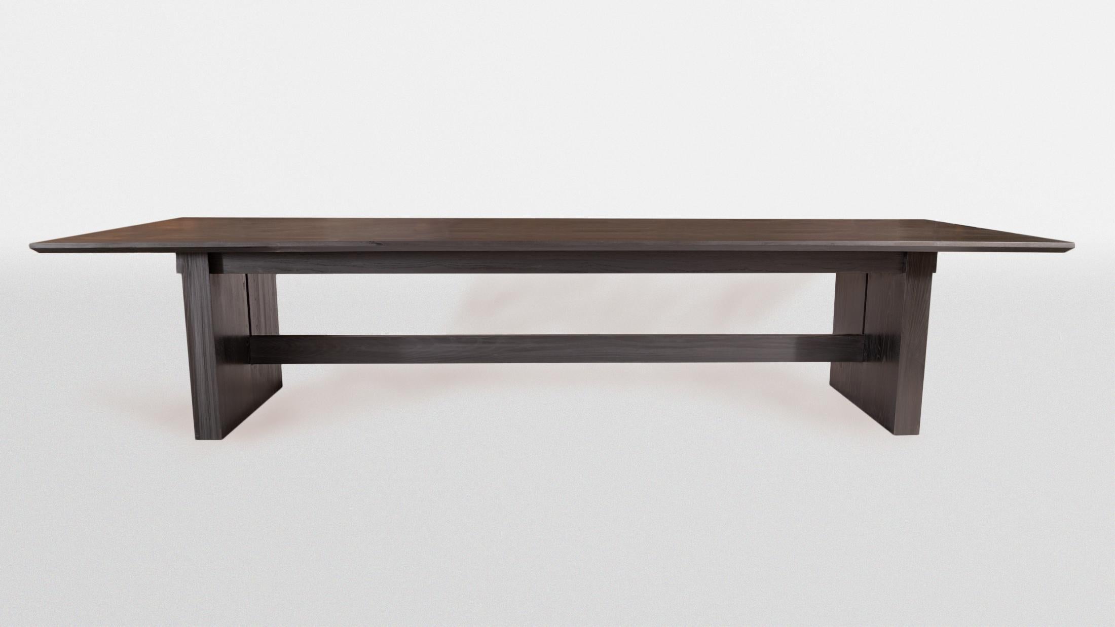 We love the way the grain shouts when you blacken Ash, so we modified our Magnolia Dining Table to highlight it. A mix of Modern and Japanese design, the Magnolia Conference Table features blackened-ash, a modern trestle-base and exposed joinery.