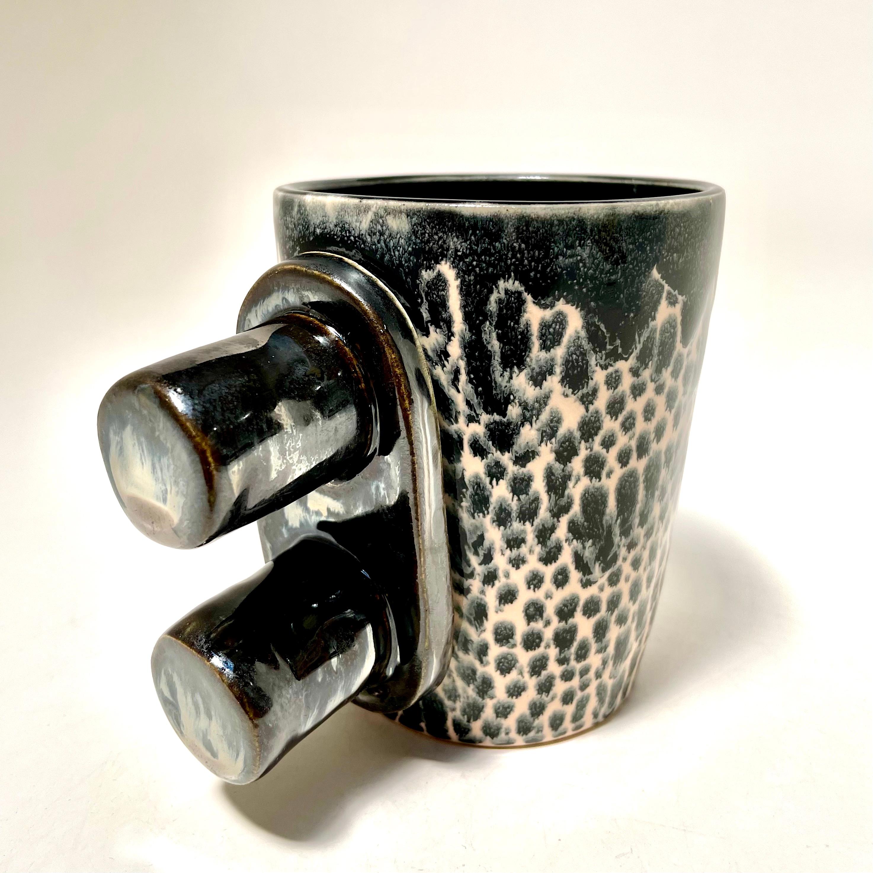 The Magnum Double Barrel, shown here in galaxy and broken silver, the food safe vessel for your favorite beverage of choice, entertaining, or as a decorative object or objet d'art. Versatile, sustainable and one of kind, made of recycled stoneware