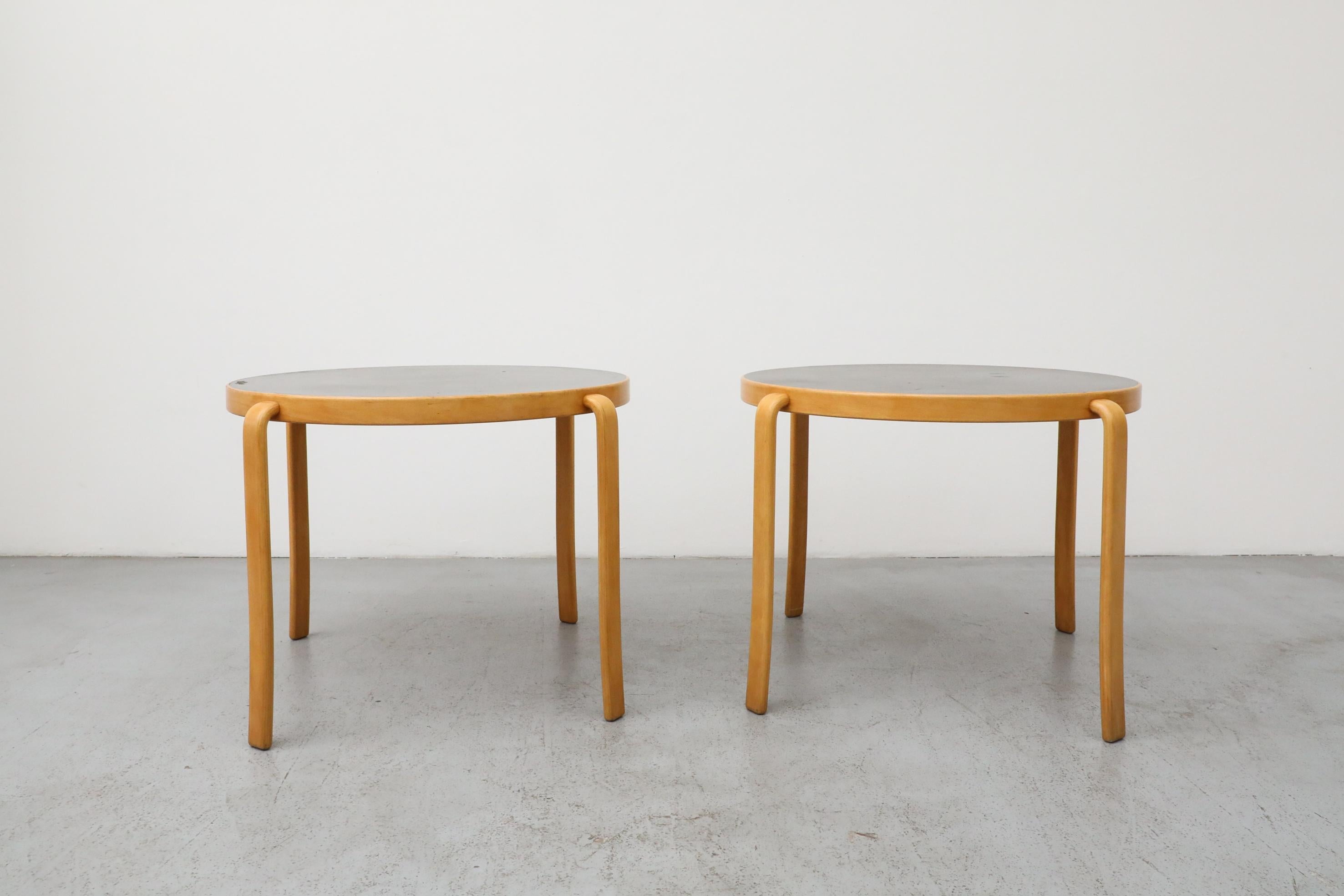 Danish modern “8000-Series” round tables designed in the 1980s by Rud Thygesen and Johnny Sørensen for renowned Danish manufacturer Magnus Olesen. This series is well known in Danish design literature and industry catalogs for its durability,