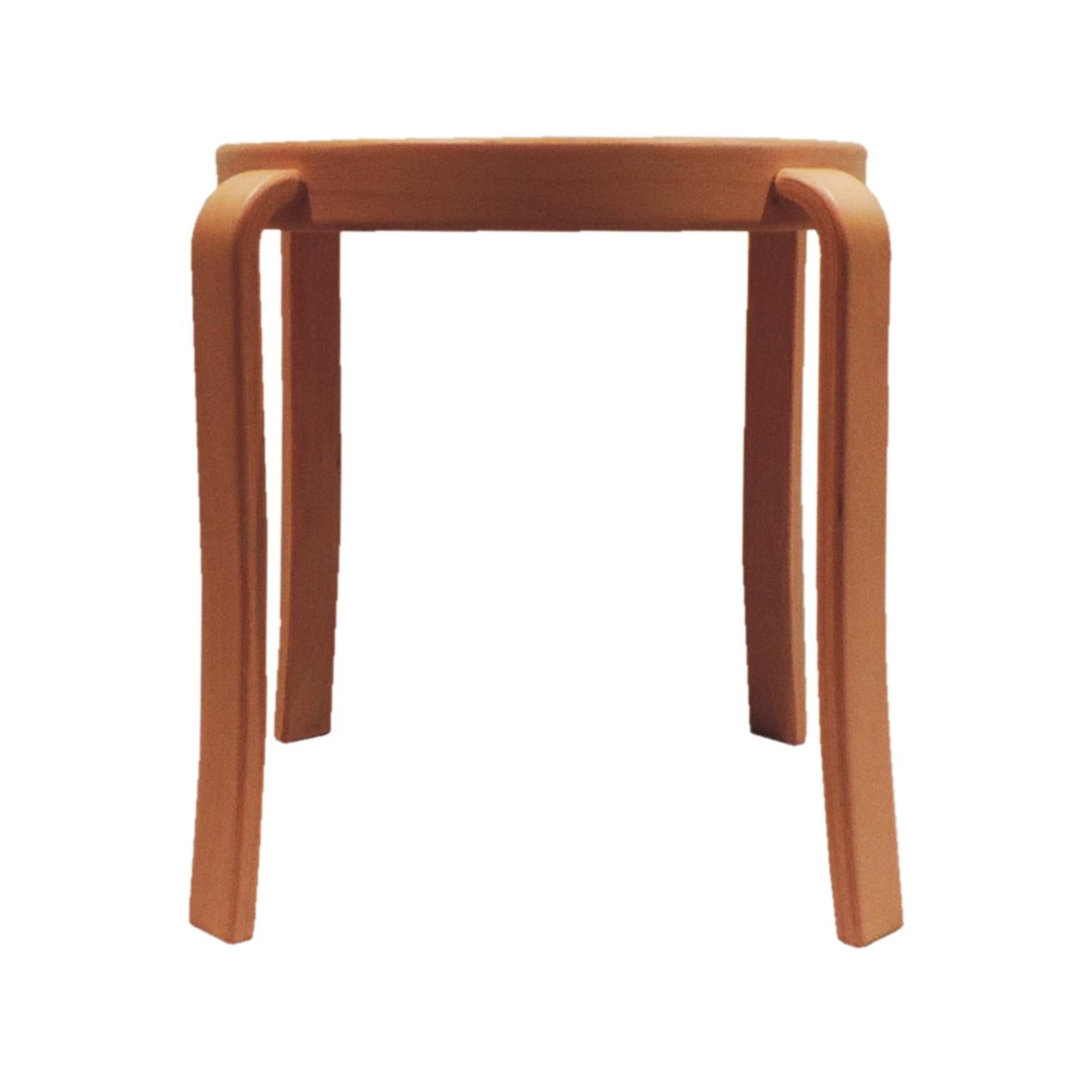 This is a versatile stool which can be used as a side table or a seat. 

Grey linoleum (anti-microbial properties) inlaid top which is extremely durable. The legs and edge of top is laminated European Beech. 

The 8000 Series is a design icon,