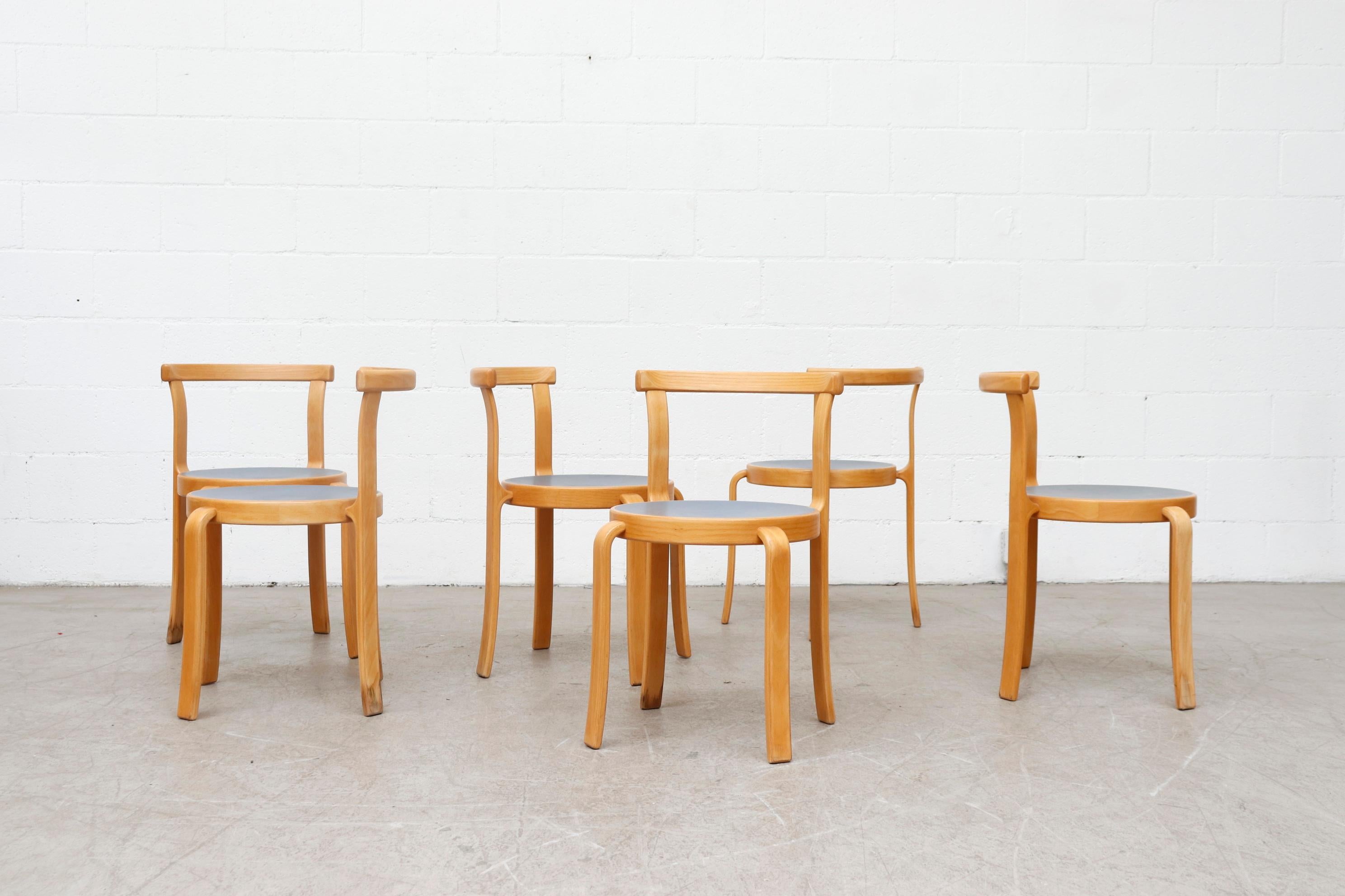 Stackable Series 8000 Danish chairs stylish curved beech wood, blue/grey linoleum seat designed by Rud Thygesen & Johnny Sorensen for Magnus Olesen 1970s. Made in Denmark. In Good original condition with some visible wear to seats and frame. Listed