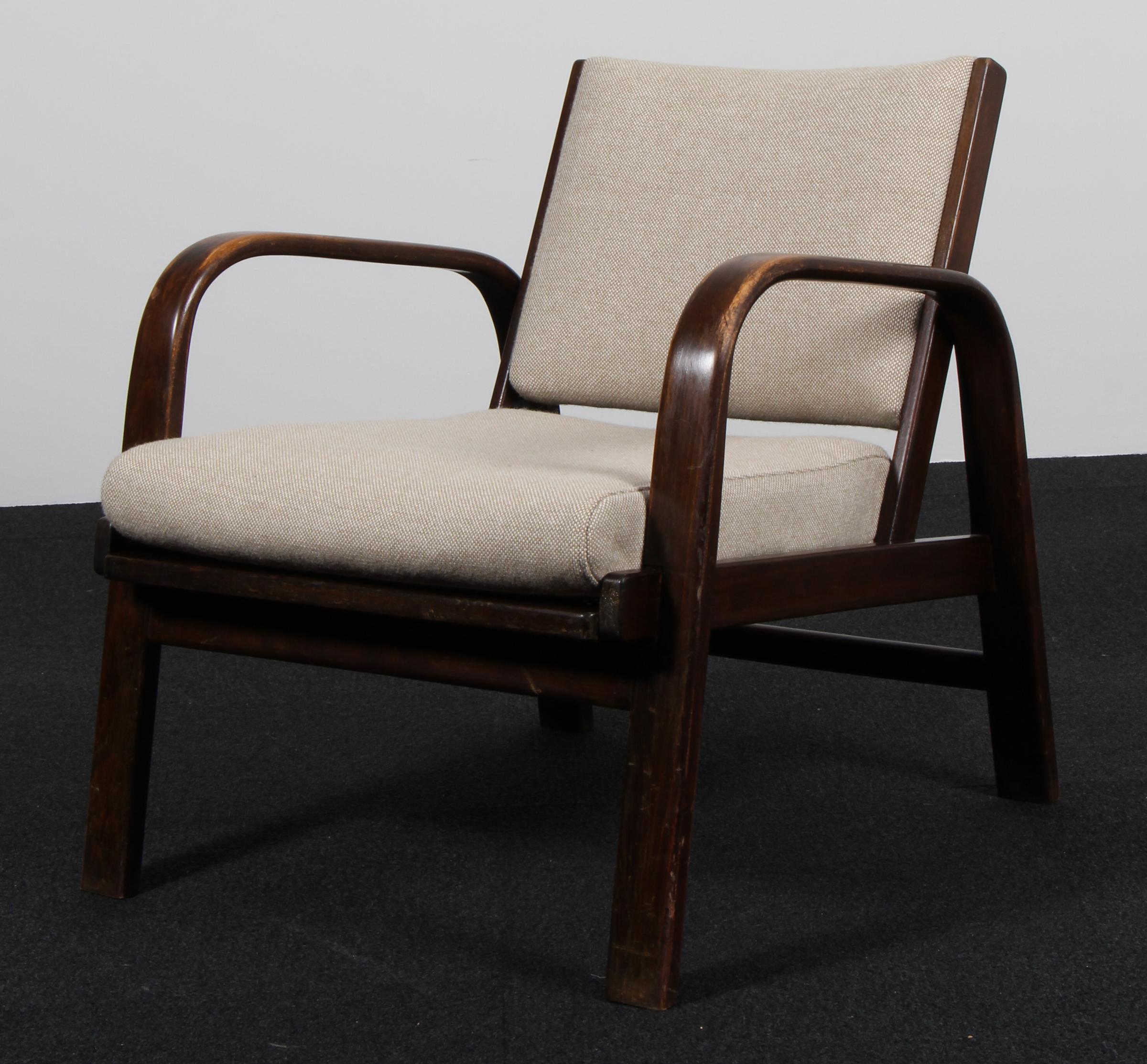 Chaise longue Magnus Beeche avec structure en hêtre teinté. Nouveau revêtement en laine Hallingdal. Avec la canne d'origine dans le siège.

Fabriqué par Fritz Hansen dans les années 1930