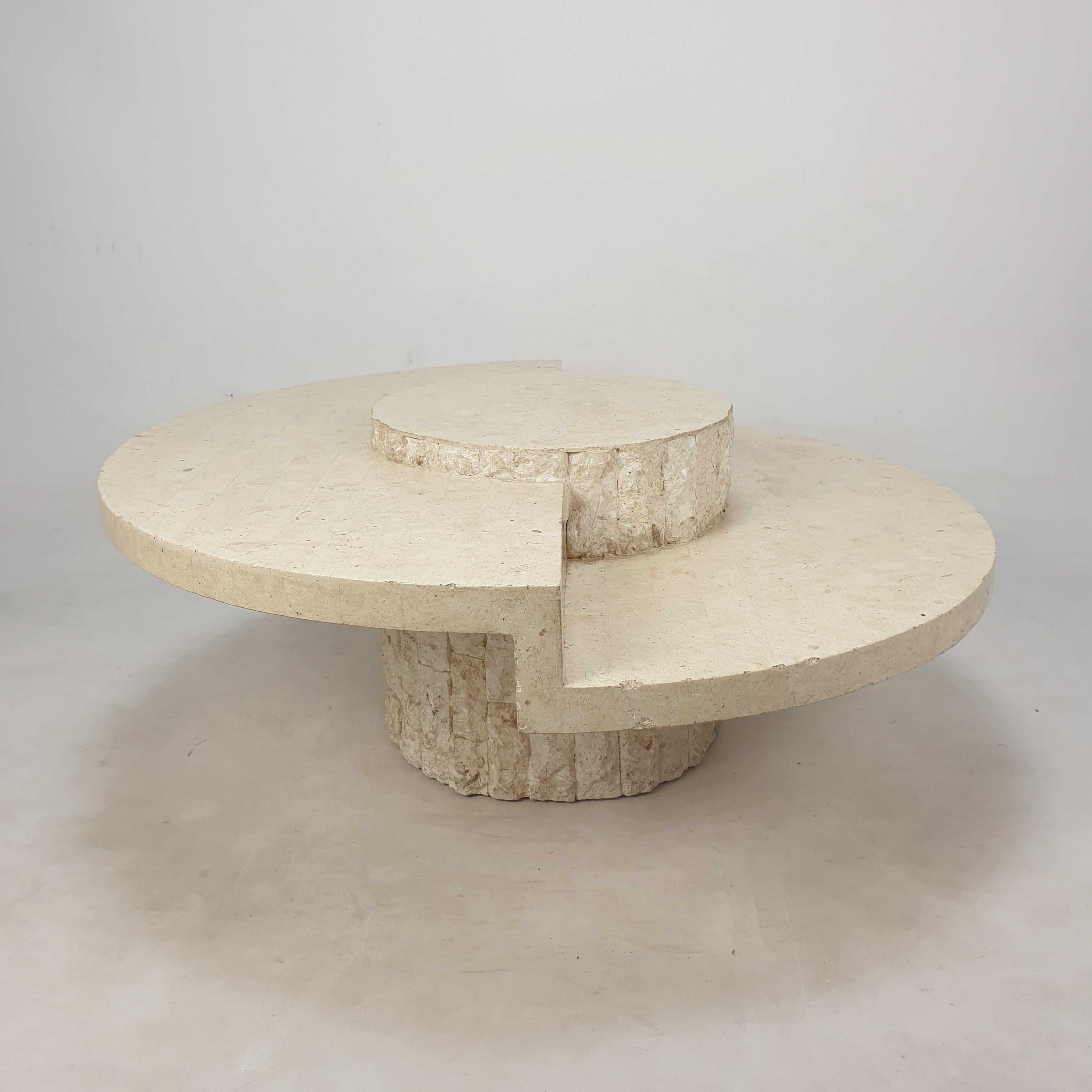 Very nice coffee or side table by Magnussen Ponte, 1980's.

This stunning table is made of rough edged brick motif Mactan stone.