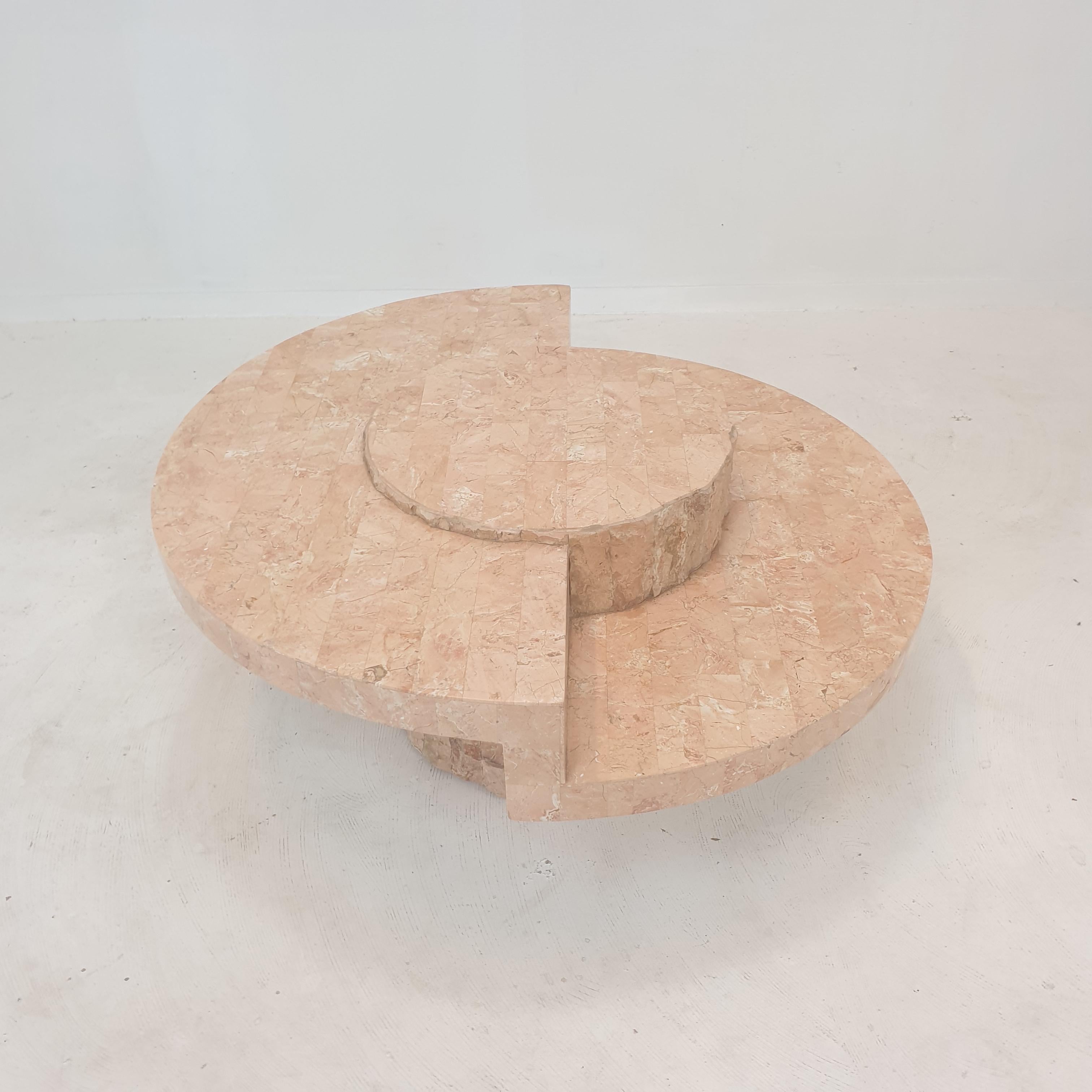 Very nice coffee or side table by Magnussen Ponte, 1980's.

This stunning table is made of rough edged brick motif Mactan stone or Fossil stone.
The weight is around 25 kg (55 lbs).

We work with professional packers and shippers, we ship