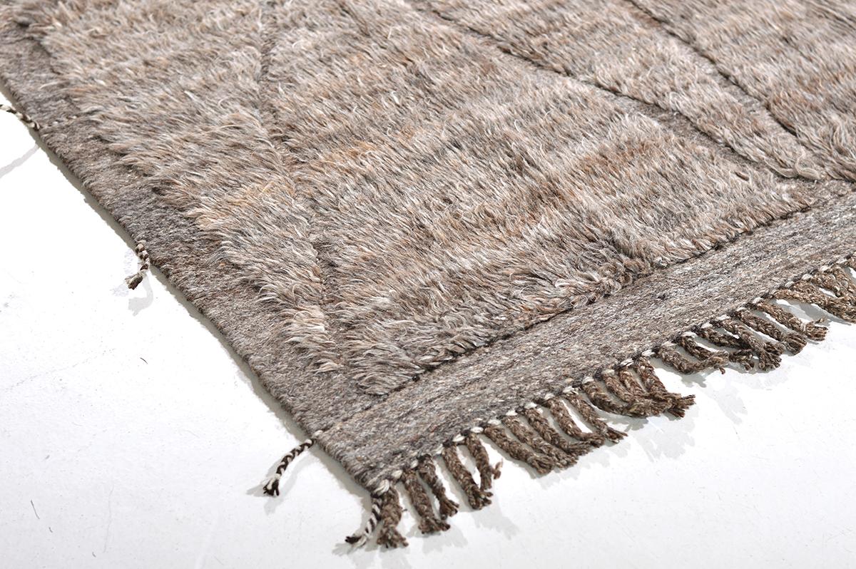 Handwoven of luxurious wool, with timeless design elements and color palette. This Mehraban design is a contemporary interpretation of an Azilal, a part of our Atlas collection. These tribal style rugs are noted for their hand-spun wool, intuitive