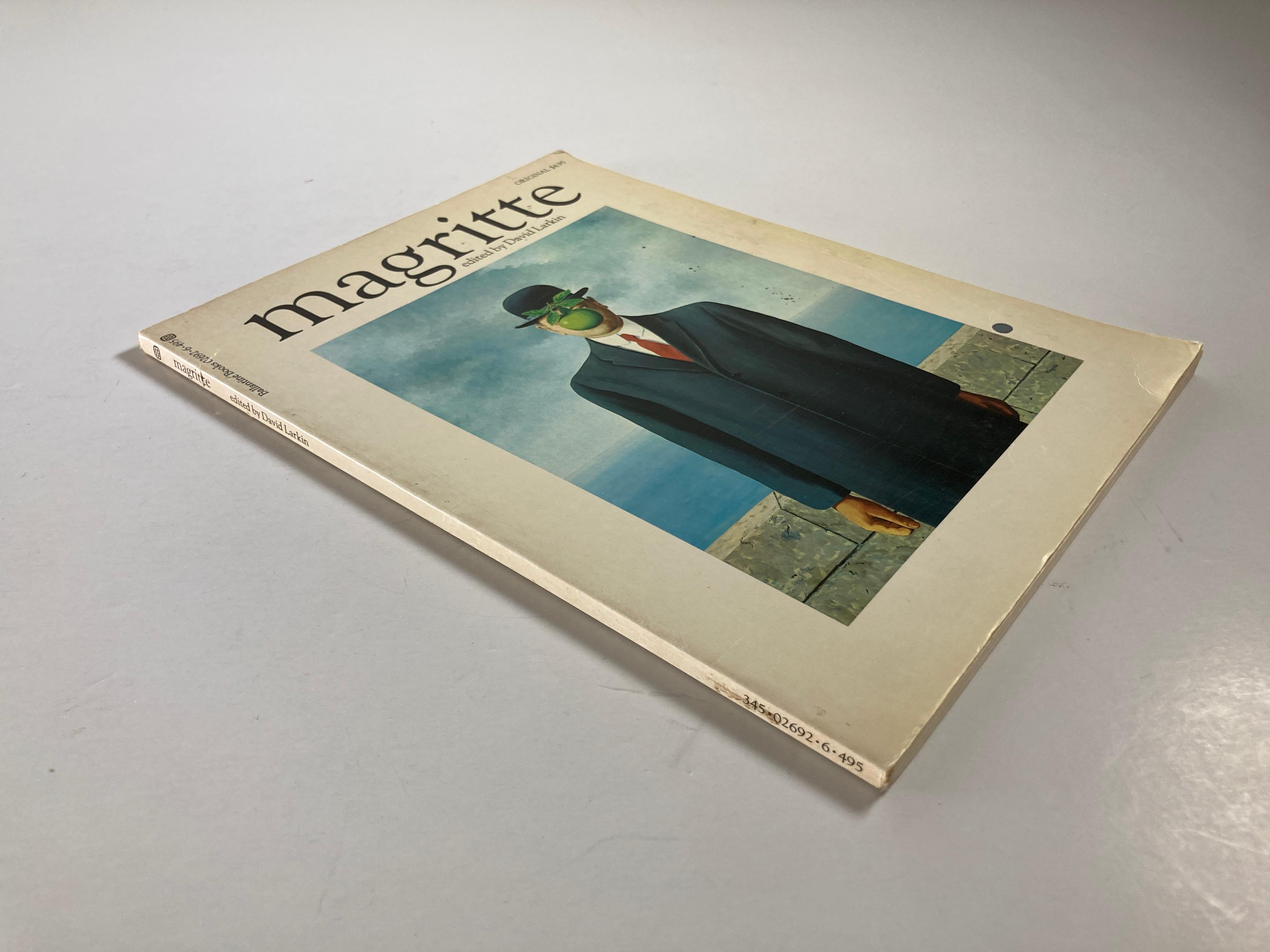 MAGRITTE by Rene Magritte. Printed in Italy.
Magritte. introduction by Eddie Wolfram edited by David, Larkin 
Published by Ballantine, 1973
The enigmatic images of the great Surrealist Rene Magritte (1898-1967) are so powerful that they seem to