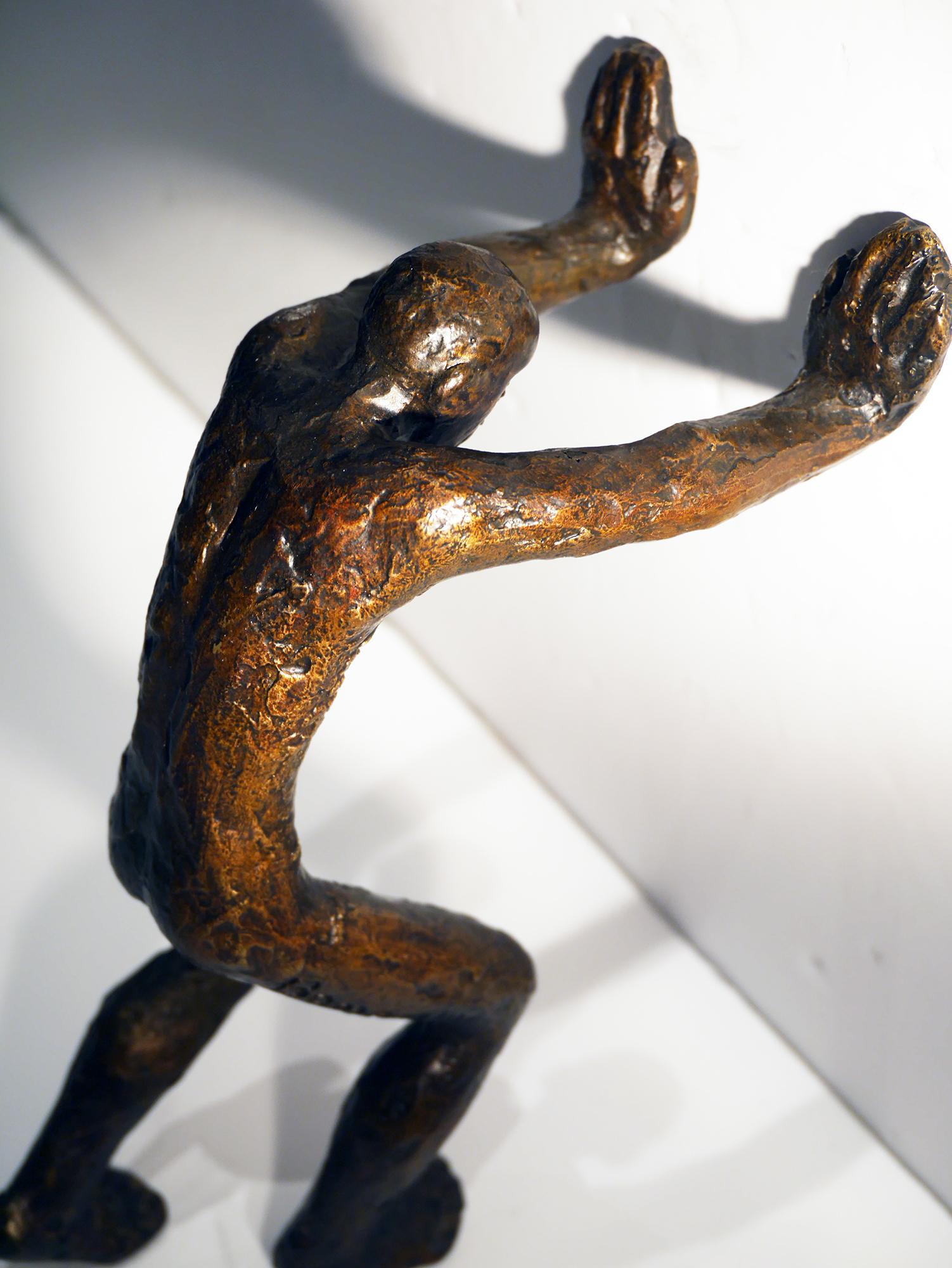 La Force, bronze sculpture, figurative human figure, man pushing a wall by Banq - Sculpture by Maguy Banq