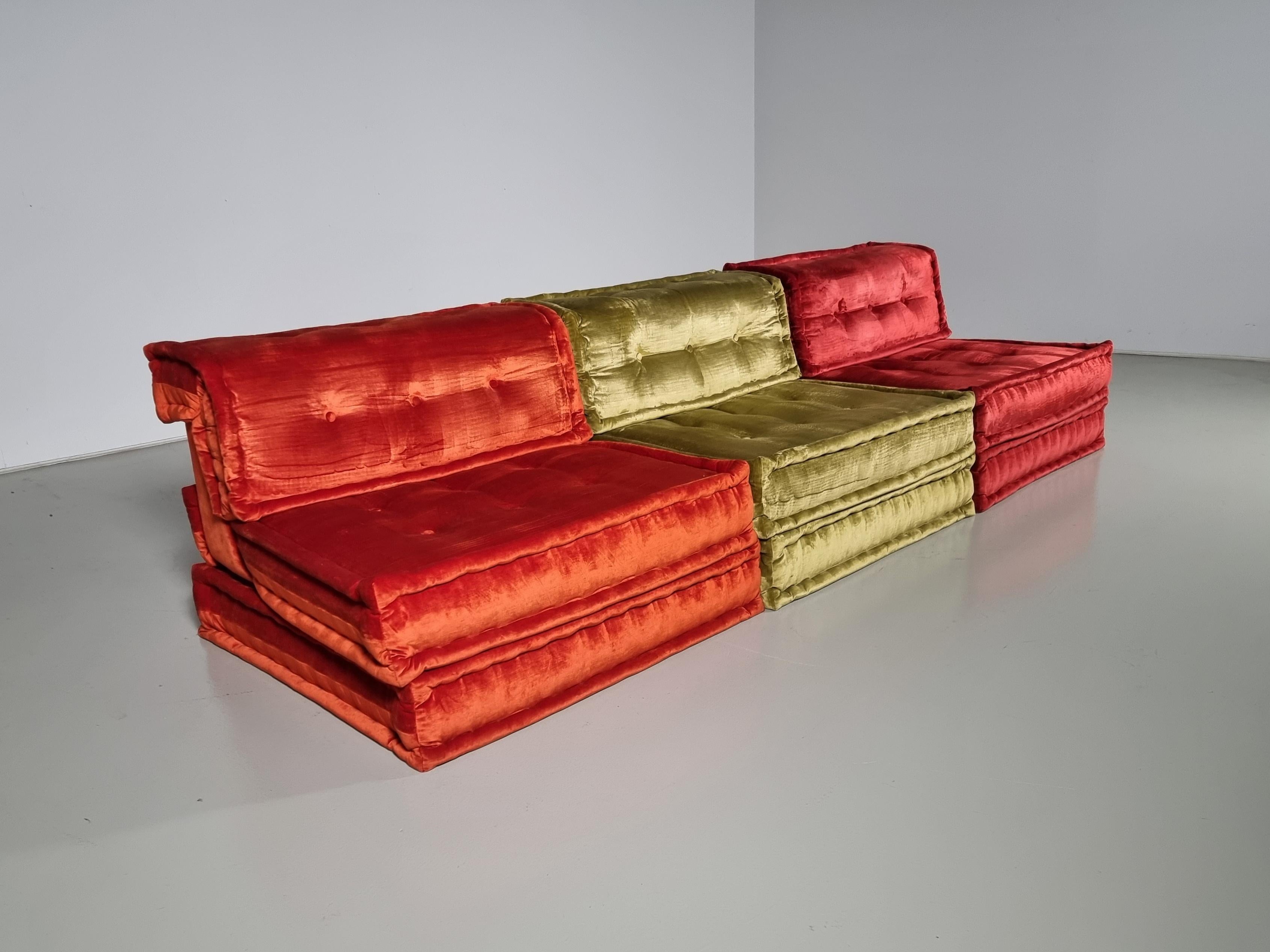 Mah Jong modular sofa set by Hans Hopfer, designed in 1971 for Roche Bobois and in a current customized mix of textiles by the house of Missoni. Features multiple cushions that can be arranged in an endless number of ways, This set includes 6