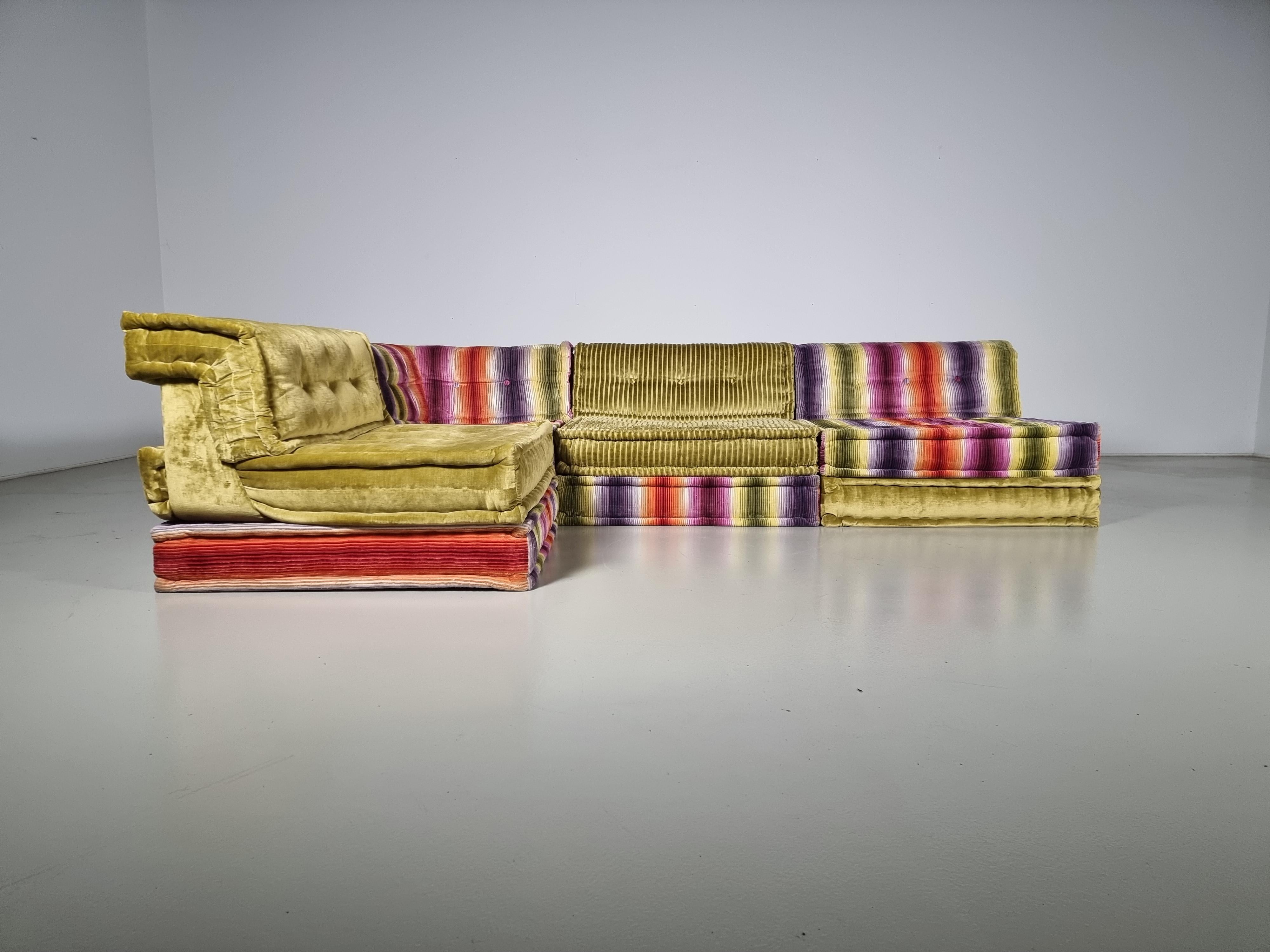 Mah Jong modular sofa set by Hans Hopfer, designed in 1971 for Roche Bobois and in a current customized mix of textiles by the house of Missoni. Features multiple cushions that can be arranged in an endless number of ways, This set includes 8
