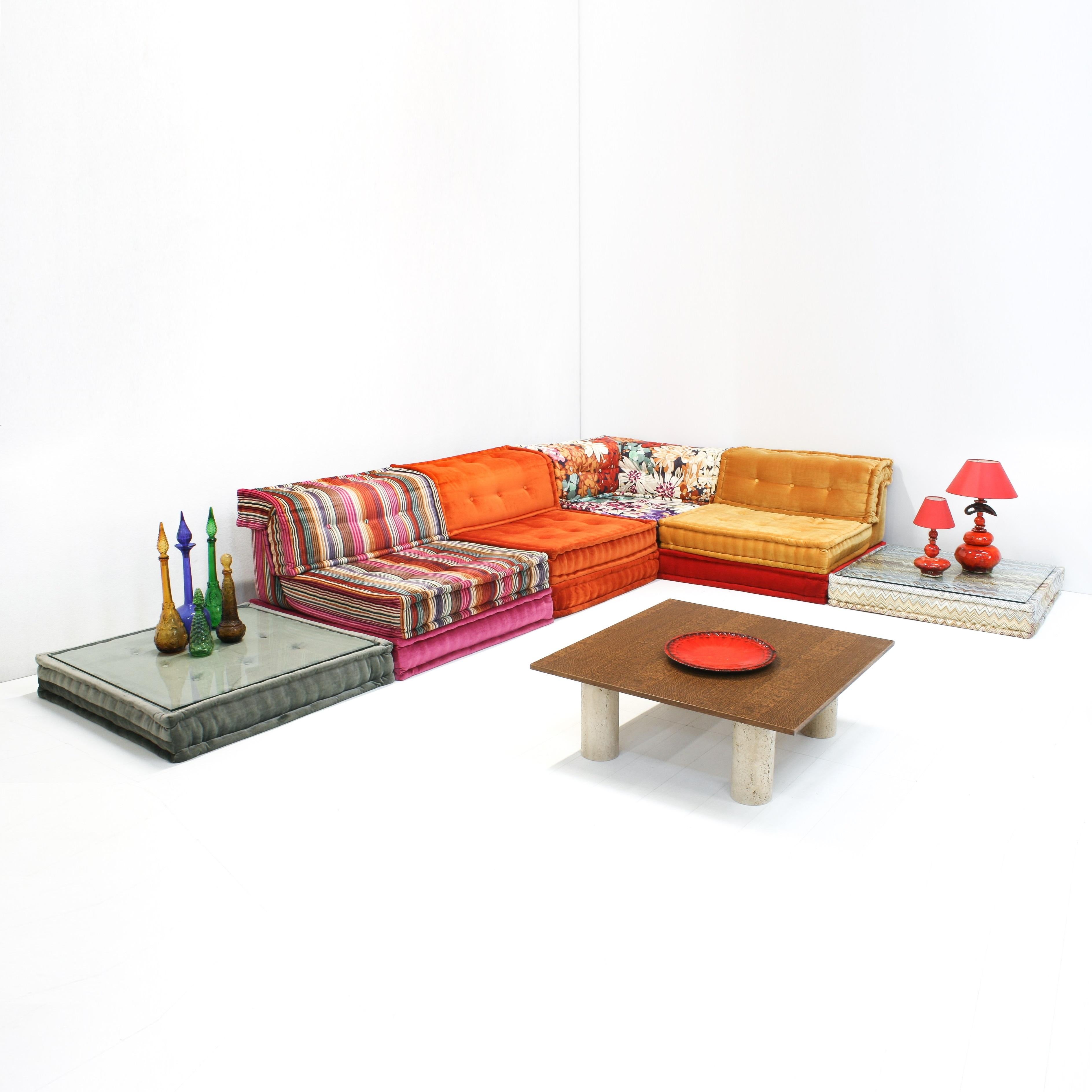 The Mah Jong sofa group was designed by Hans Hopfer for Roche Bobois in 1971.

Large modular sofa with a mixture of components, hand-sewn rolled edge, quilted seat and back cushions, upholstery designs by Missoni Home. The set comprises of 14 parts