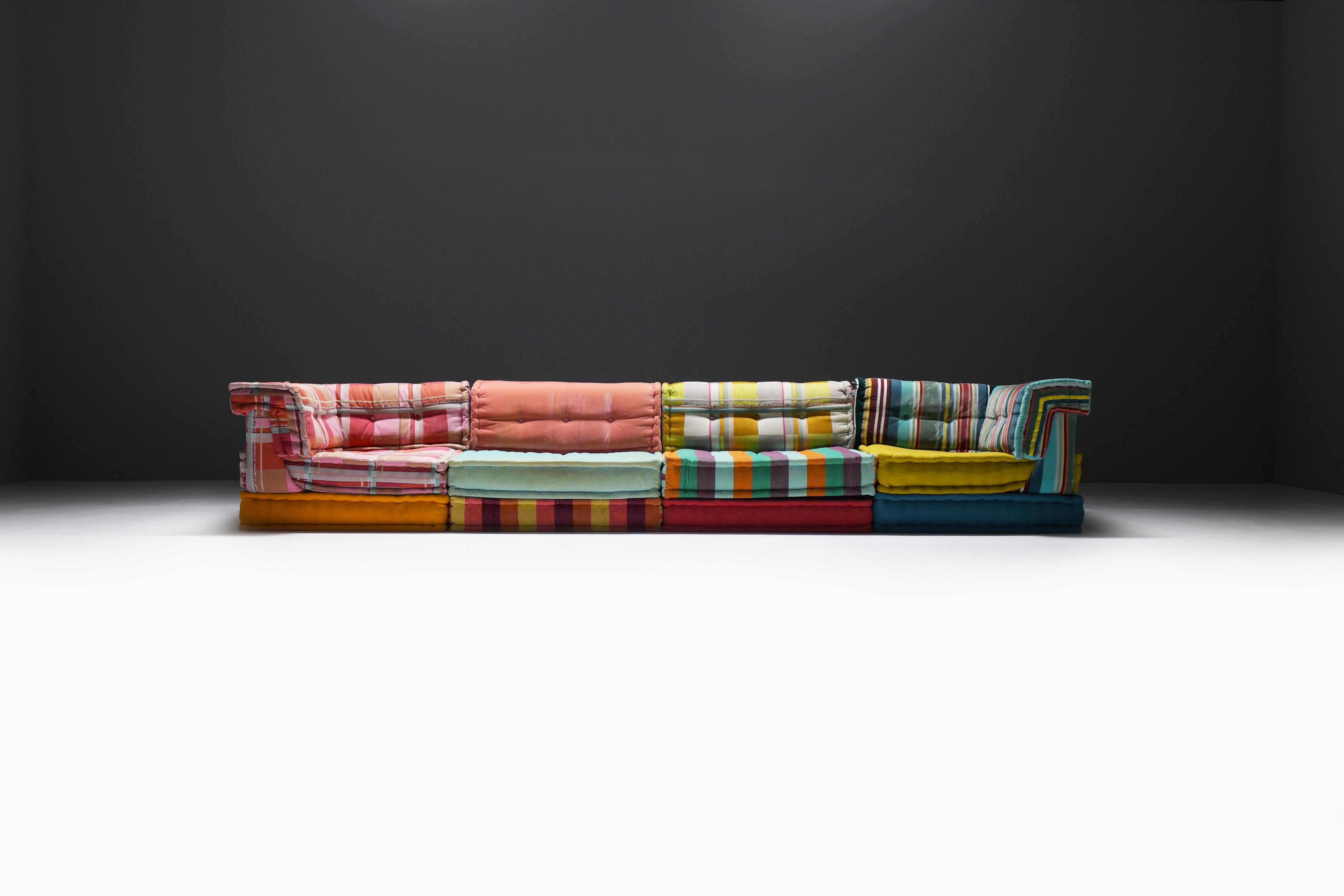 Very nice Mah Jong modular sofa with the ‘Kenzo Takada’ fabric!
Designed by Hans Hopfer for Roche Bobois France.

In the 1970s Hans Hopfer created the Mah Jong lounge sofa, Roche Bobois’s most recognised and iconic design. The freedom of form that