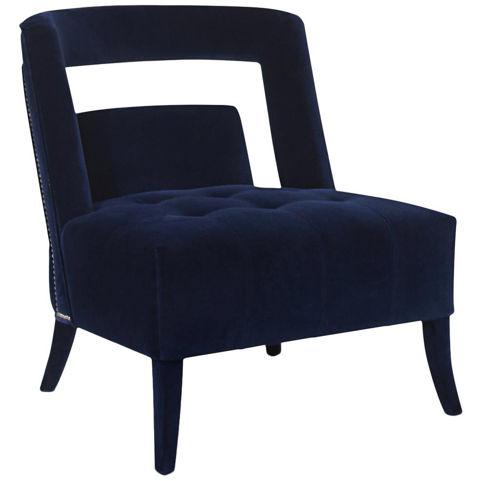 Fauteuil Mahal avec tissu en velours bleu