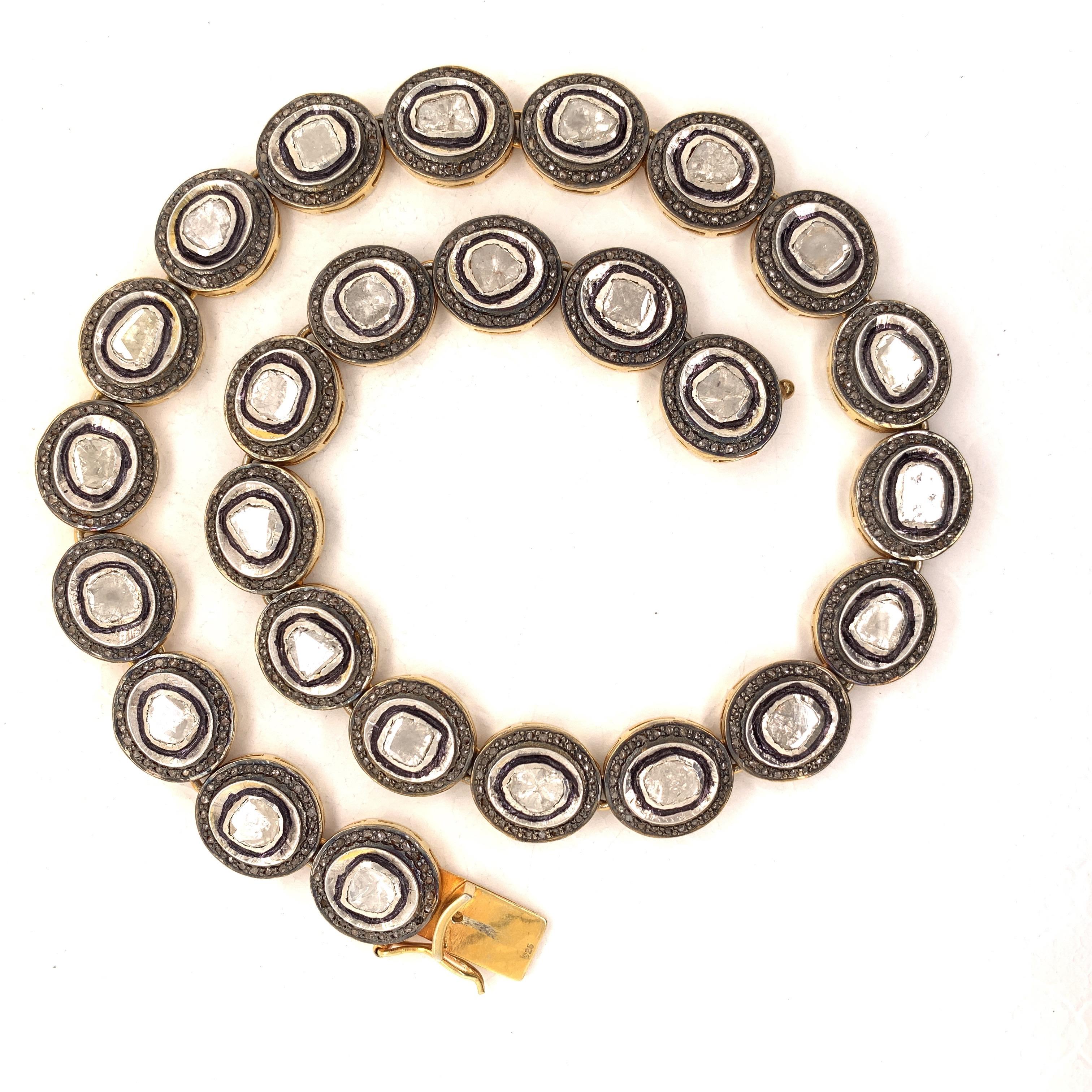 Collar de diamantes de inspiración maharajá. Diamantes naturales contemporáneos talla fantasía, talla tabular de 20 quilates, montados en engaste biselado,  rodeado de esmalte negro,  acentuado con pequeños diamantes en engaste micro pavé oxidado.