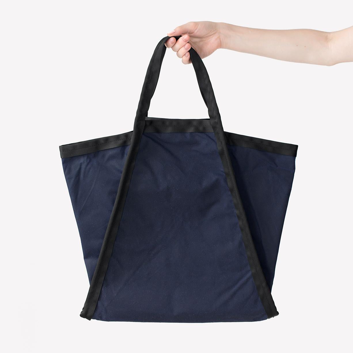Maharam Bag
Three by Konstantin Grcic 
003 Indigo/Black

Konstantin Grcic (b. 1965, Germany) is a Munich-based industrial designer who combines deep research with an investigation into emerging technologies. He trained as a cabinetmaker before