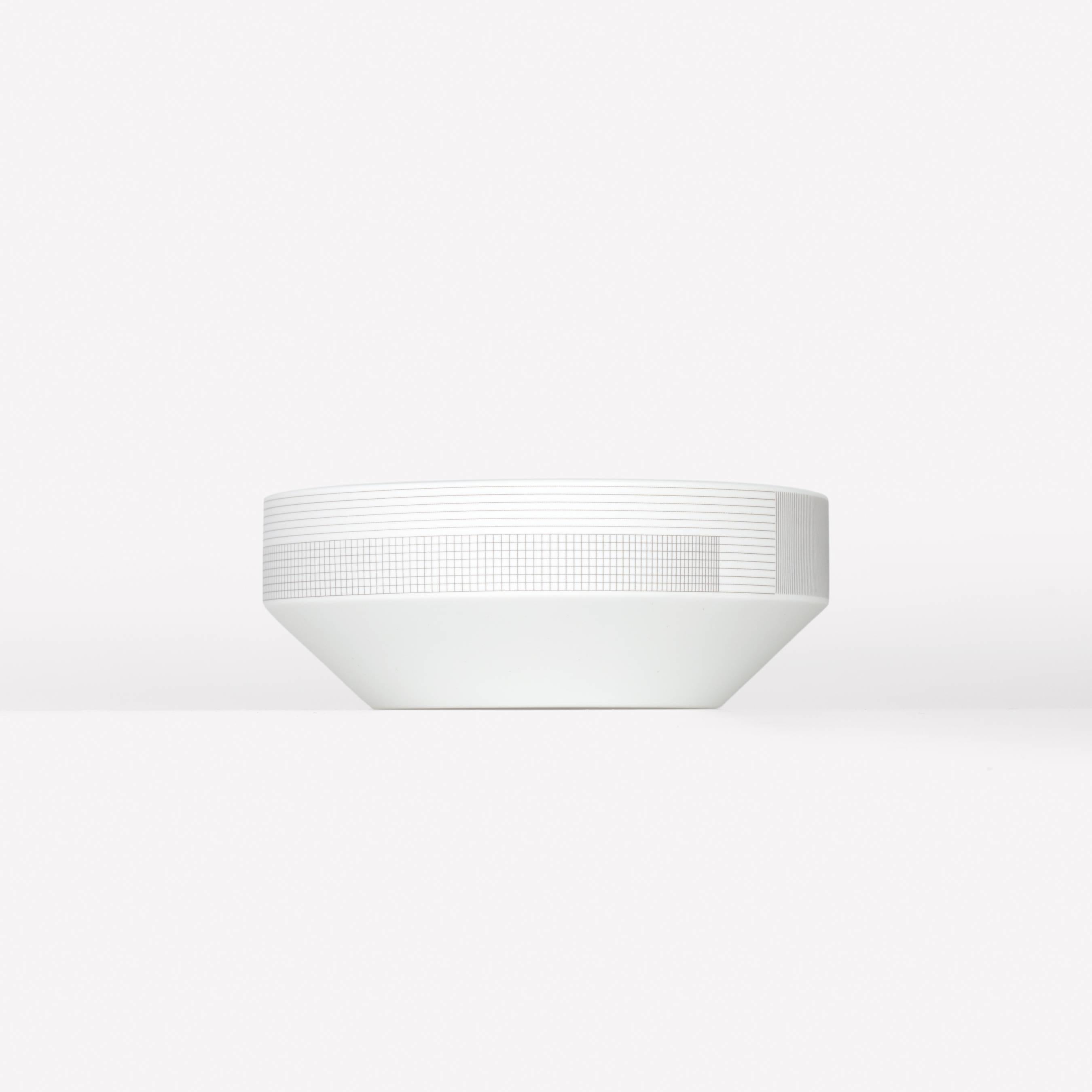 Pattern Porcelain Bowl by Scholten & Baijings
003 Zinc

Porcelain with Grid textile graphic. Matte exterior with gloss interior. Made in Japan by 1616 / arita japan. 

Dishwasher safe.

Scholten & Baijings for Maharam is a collection of home goods