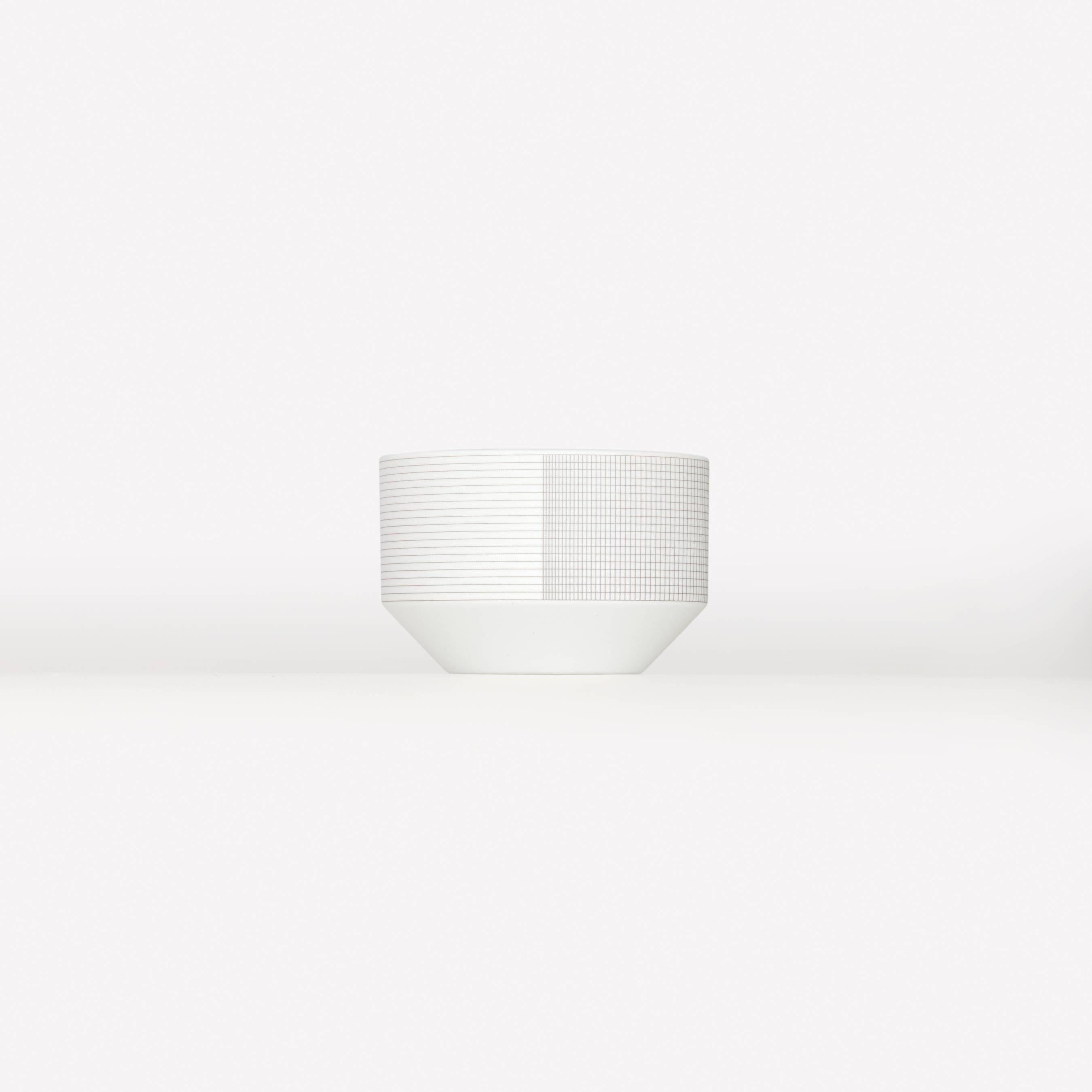 Pattern Porcelain Cup by Scholten & Baijings
003 Zinc

Porcelain with Grid textile graphic. Matte exterior with gloss interior. Made in japan by 1616 / arita Japan. Dishwasher safe.

Scholten & Baijings for Maharam is a collection of home goods and