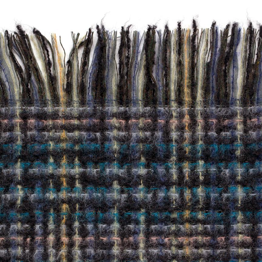 Maharam Throw
Passel 
003 Rosella

Adapted from Maharam's eponymous upholstery textile, Passel Throw is woven in France on the same looms used to produce many Chanel suiting materials. A light brushing process lends a lofty body and soft hand to