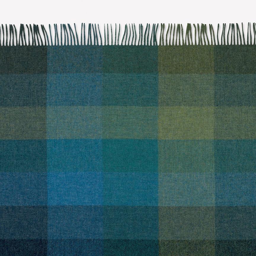 Maharam throw
Wool Check by Paul Smith
005 Iris

A natural extension of Maharam’s work with textiles, Wool Check Throw was developed based on a woven upholstery designed by Paul Smith in collaboration with the Maharam Design Studio. A study of