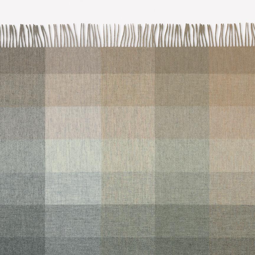 Maharam throw
Wool check by Paul Smith
001 Birch

A natural extension of Maharam’s work with textiles, wool check throw was developed based on a woven upholstery designed by Paul Smith in collaboration with the Maharam Design Studio. A study of