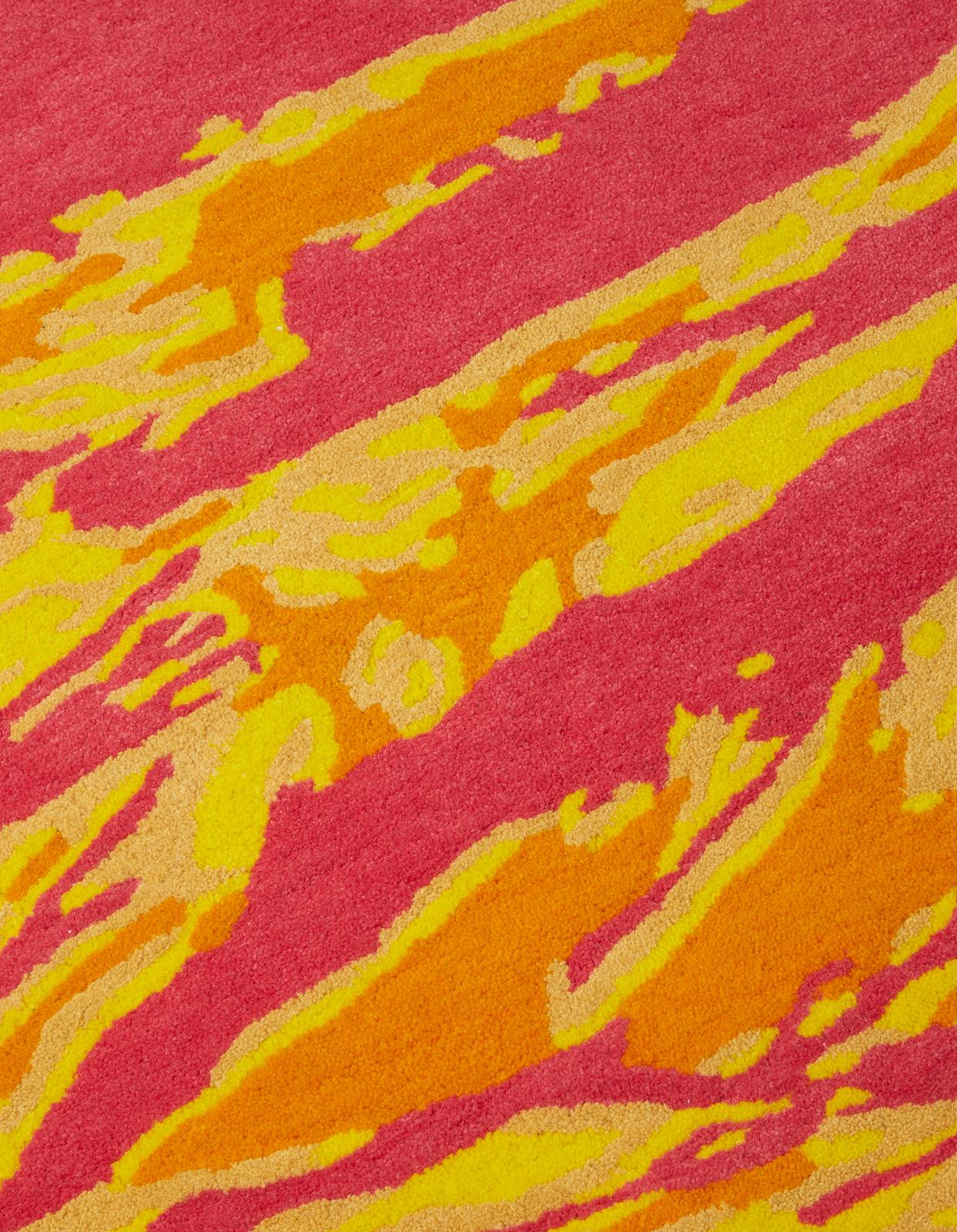 Maharishi and The Andy Warhol Foundation continue their ongoing series of collaborative works with this wool rug. 

Based on Andy's 1986 camouflage works, his vivid pop colours have been reworked in DPM: Tigerskins. Each rug is hand tufted and