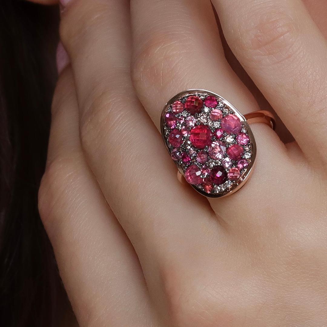 One of a kind Mahenge and Pink Spinel, Pink Tourmaline, Pink Diamond and Ruby Rose Gold Ring, meticulously crafted by Belgian jewellery artist Joke Quick. 
This extraordinary piece captures the essence of elegance and sophistication with its