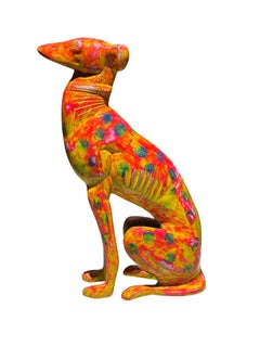 Escultura de perro vibrante