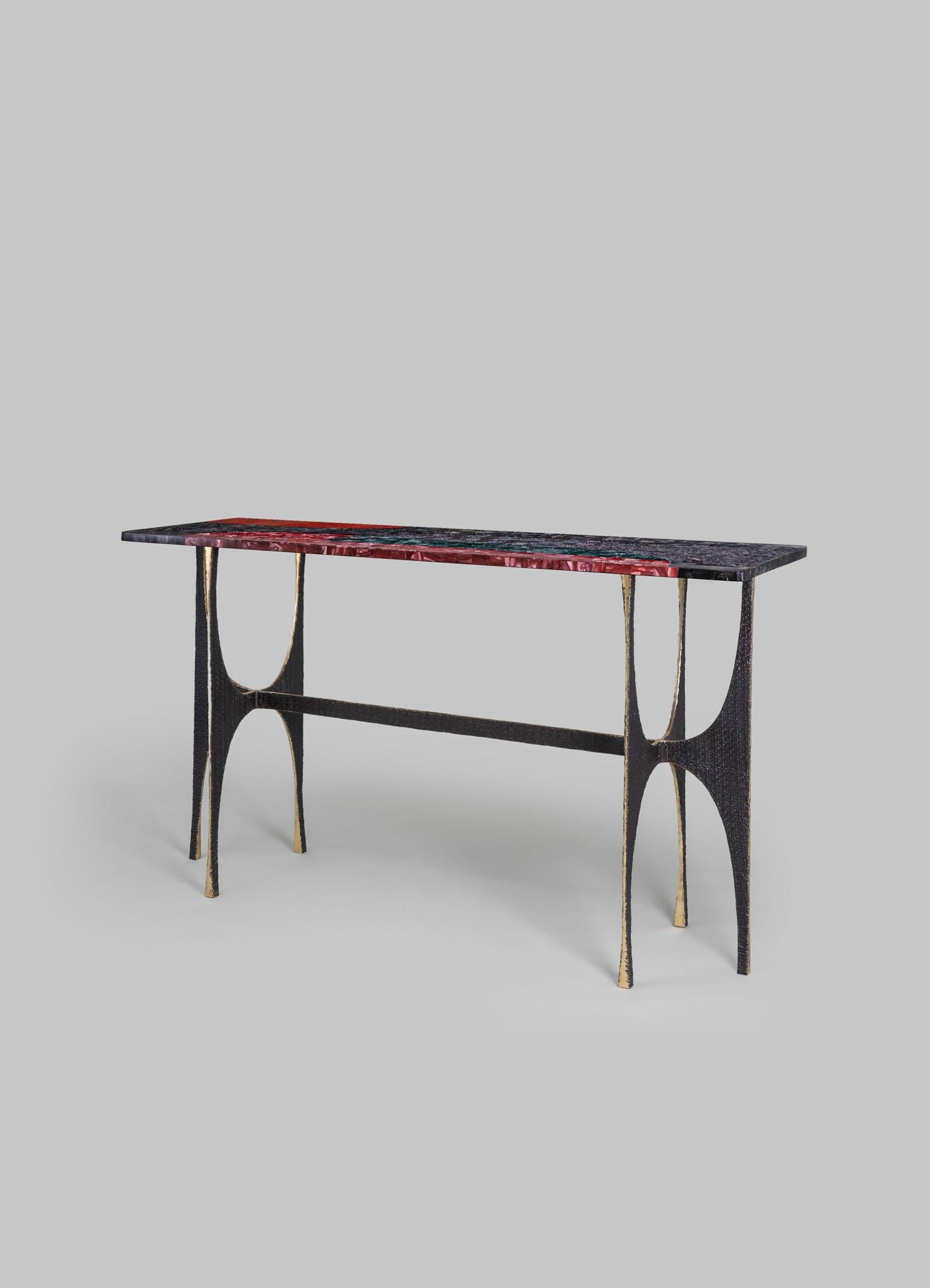 Maheshwar Console Table in Semi Precious Overlay Top, Viya by Vikram Goyal

Unfurling ceaselessly, India discovers its eternal muse in the realm of textiles. From the liquid silks of the South to the intricate brocades of the North, handwoven