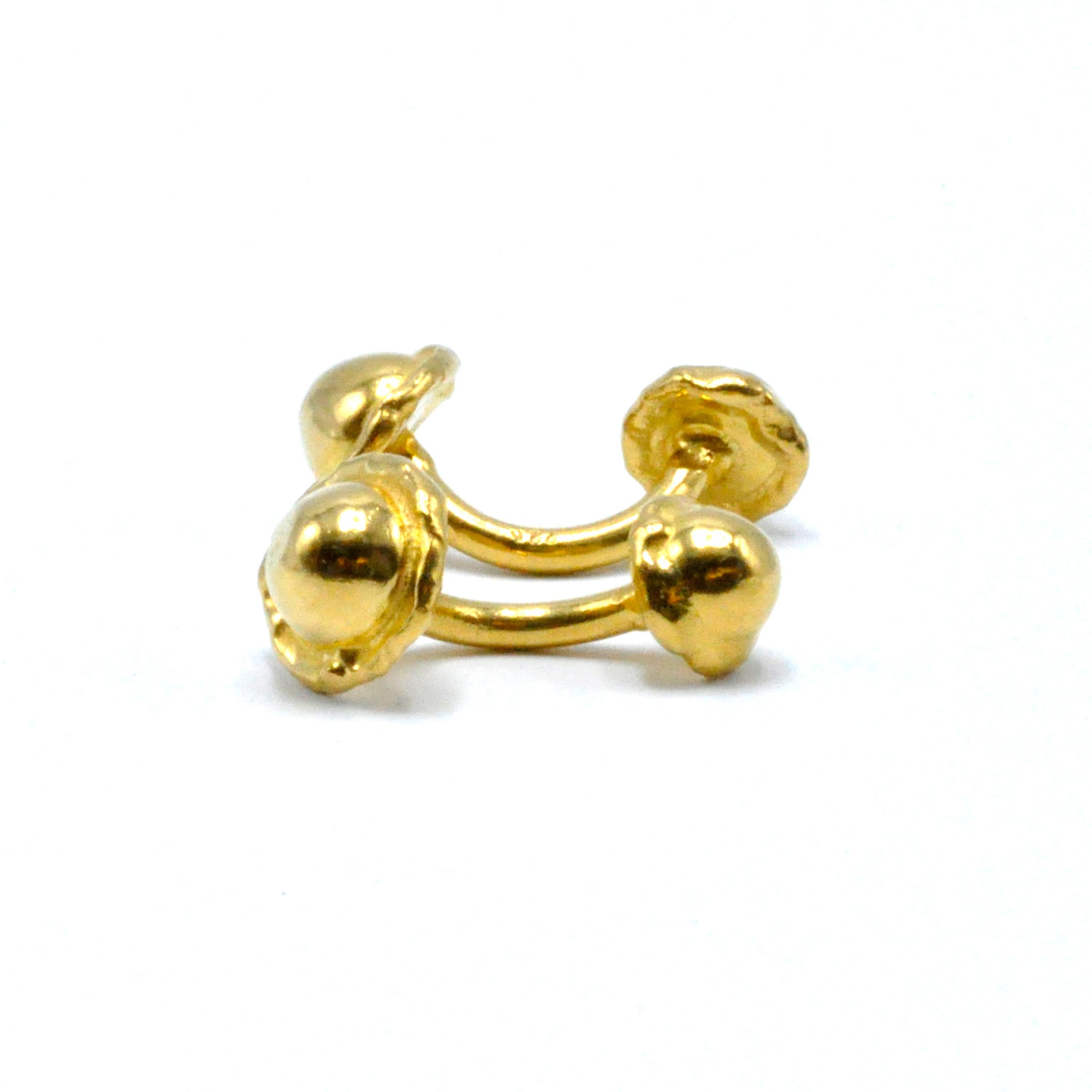 These bold Mahie 22 karat yellow gold cufflinks are sure to define your look. 

Stamped: 22K, JM
