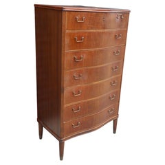 Mahogany 1950s English serpentine front 'tall boy' chest of drawers 