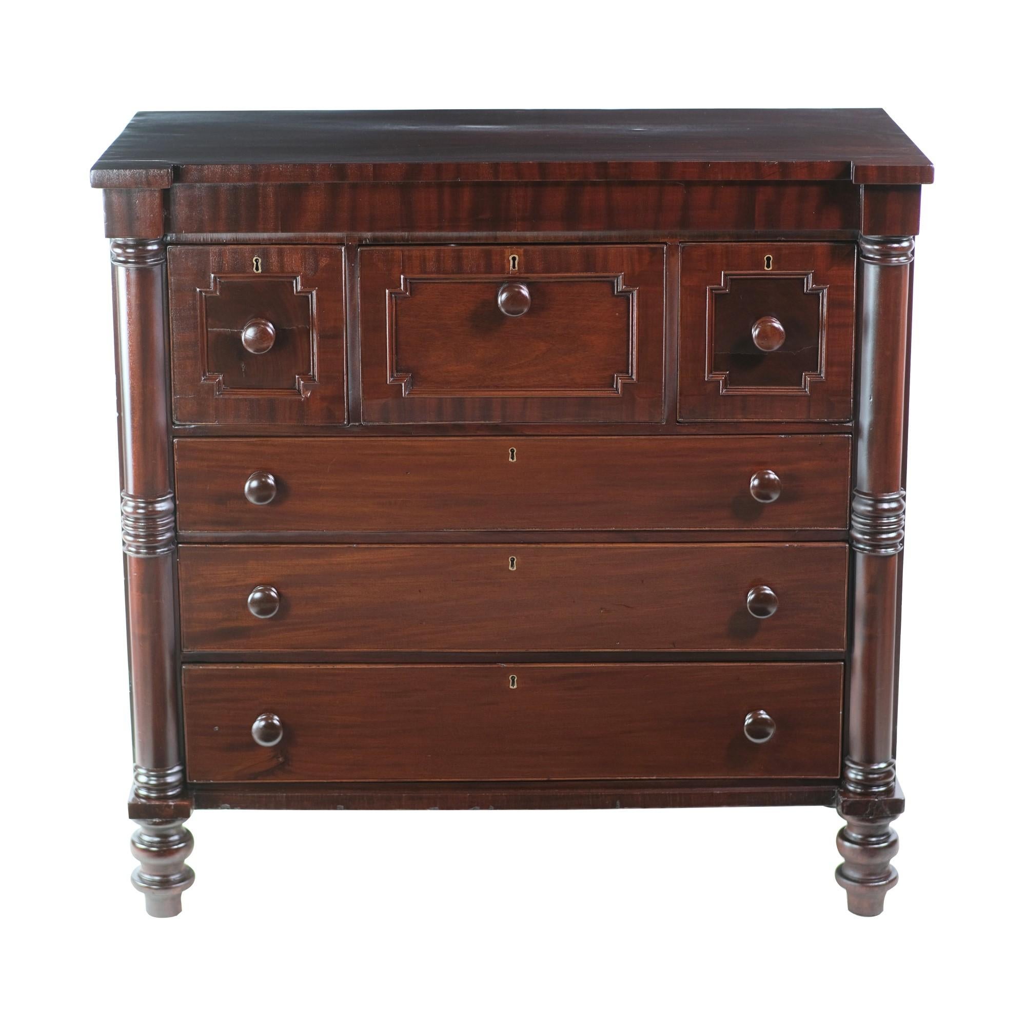 Dark tone mahogany dresser with six chestnut drawer interiors. Done in an Empire style. No key. This can be seen at our 302 Bowery location in NoHo in Manhattan.
