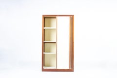 Armoire à panneaux en acajou et beige, par André Sornay, France, années 1960