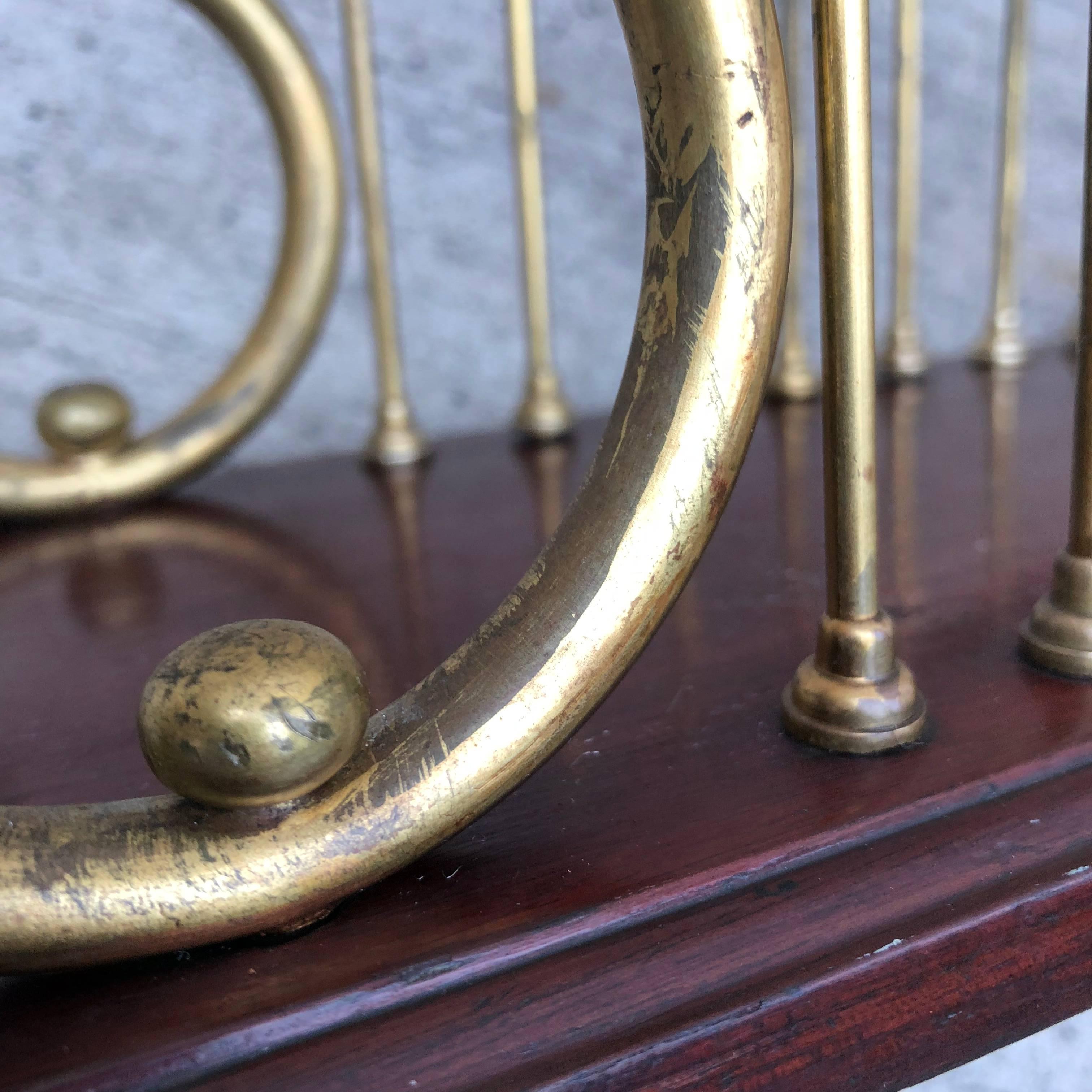 Mahogany and Brass Harp Shaped Magazine Rack 1