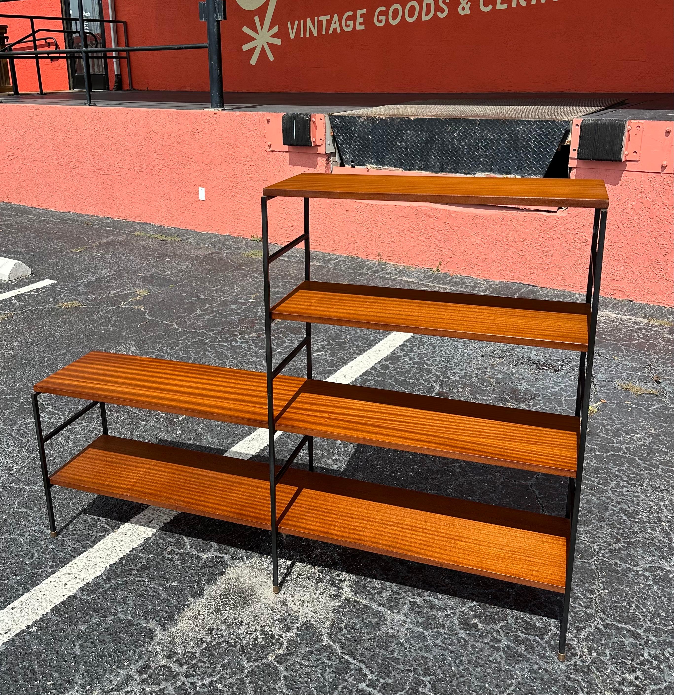 Mid Century Mahogany and Iron freestanding shelf circa 1960’s, 54”W x 13.25”D x 48.25”H - 21.5”H. Maker unknown, possibly Danish design, finished on both sides so can be used either orientation or as a room diver. Shelves are fixed height and not
