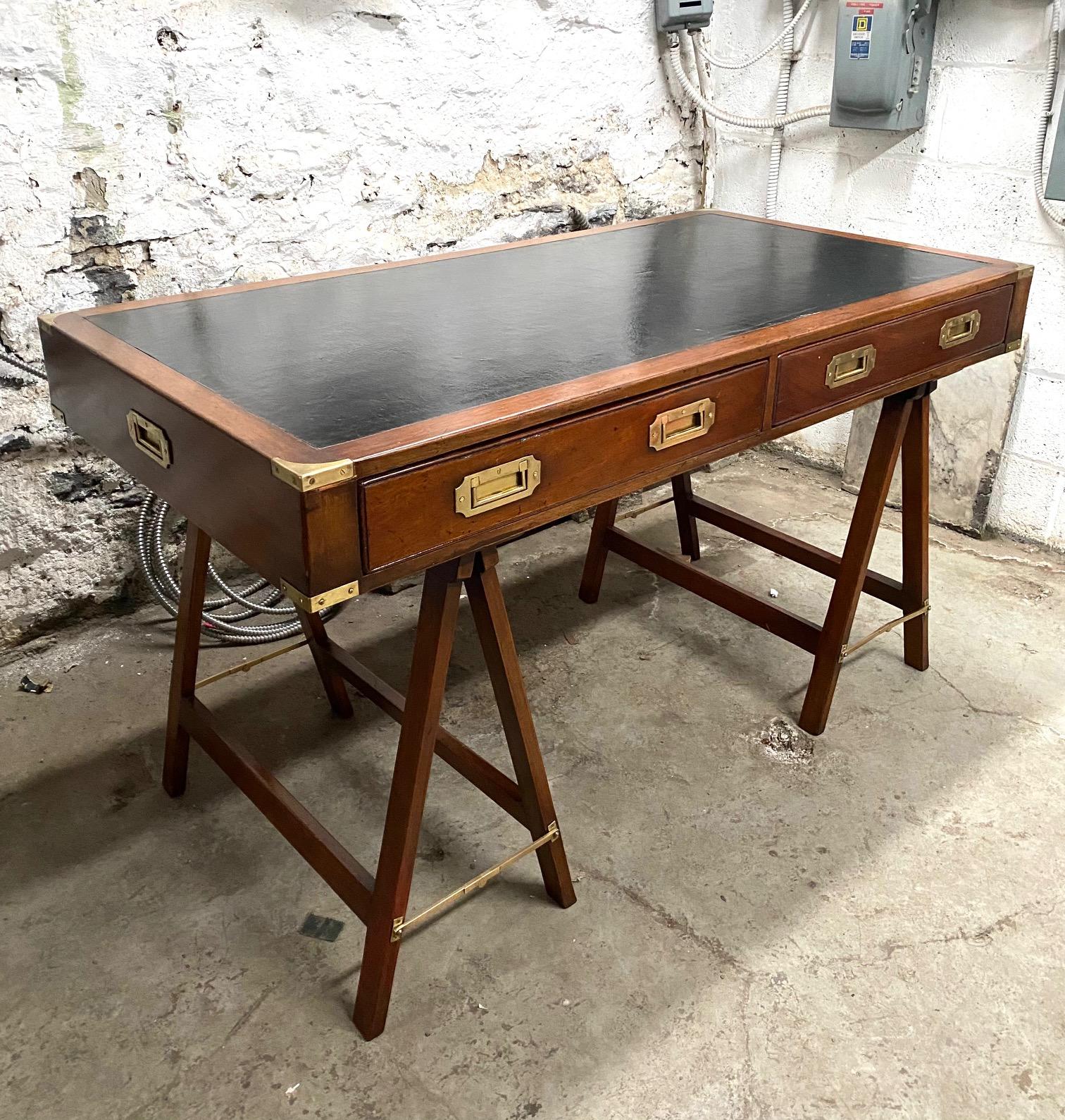 Mid-20th Century Mahogany and Leather English Campaign Desk Resting on Stretcher Base For Sale