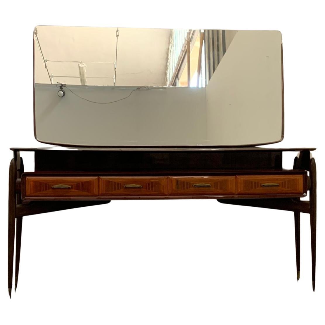 Console with Mirror from the 1950s in mahogany and rosewood with brass tips.