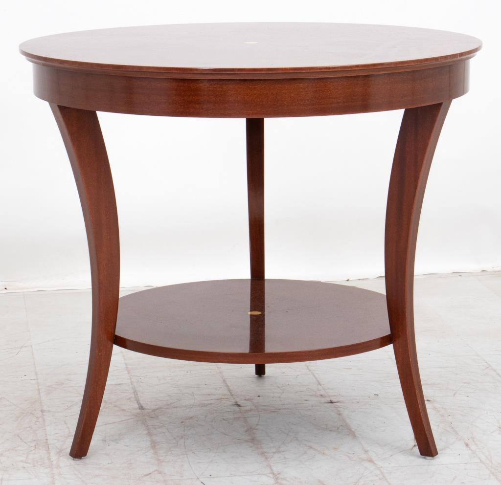 Mahogany and Satinwood Table, 20th Century. Circular inlaid table in Neoclassical and Biedermeier style.

Dealer: S138XX