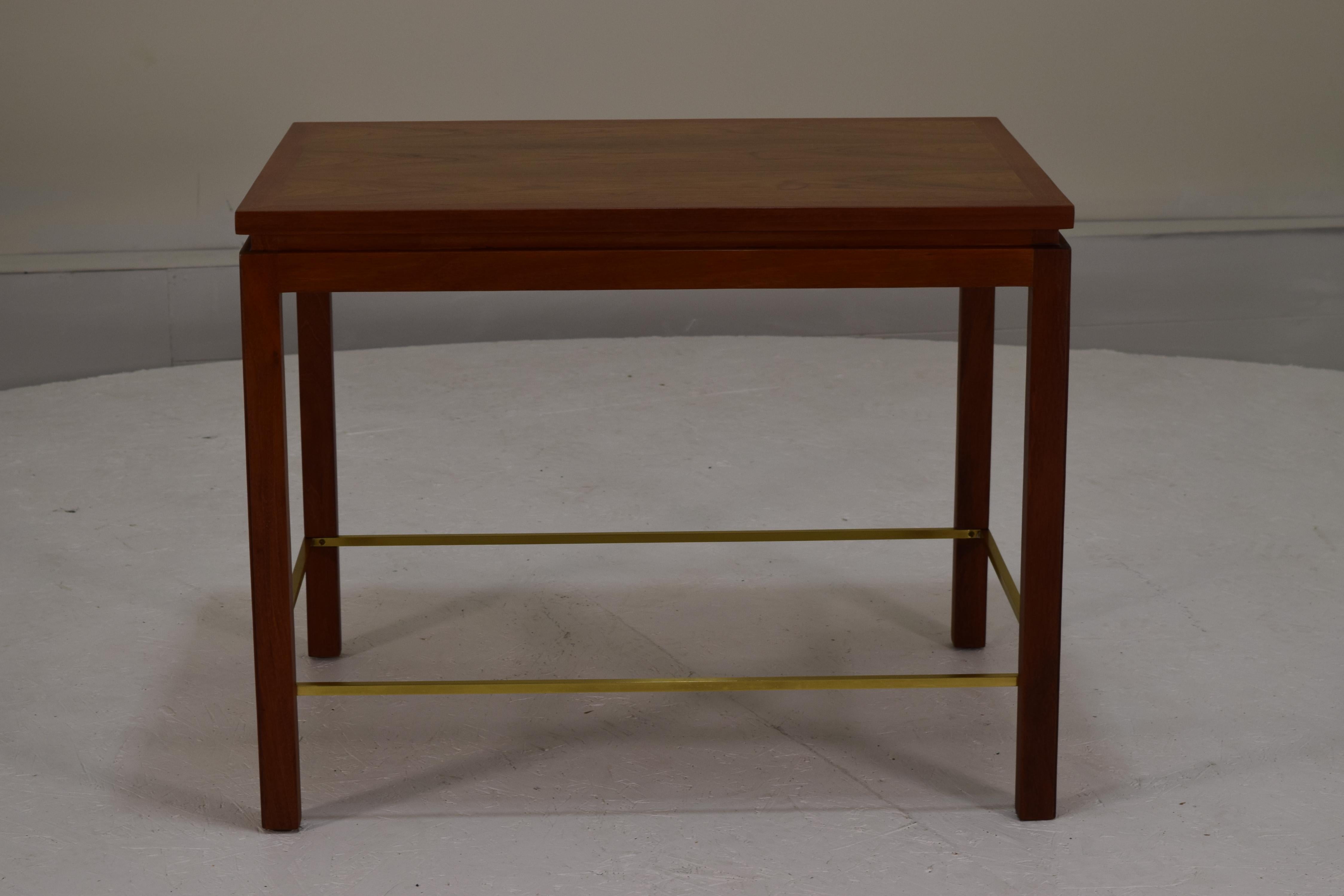 Refinished and like new.  Dunbar, Edward Wormley, USA, circa 1955, Mahogany, walnut, brass. 
Measures: 20 deep x 28 long and 22 inches tall
Solid mahogany lumber coupled with a walnut top framed in mahogany. Features a contiguous brass stretcher