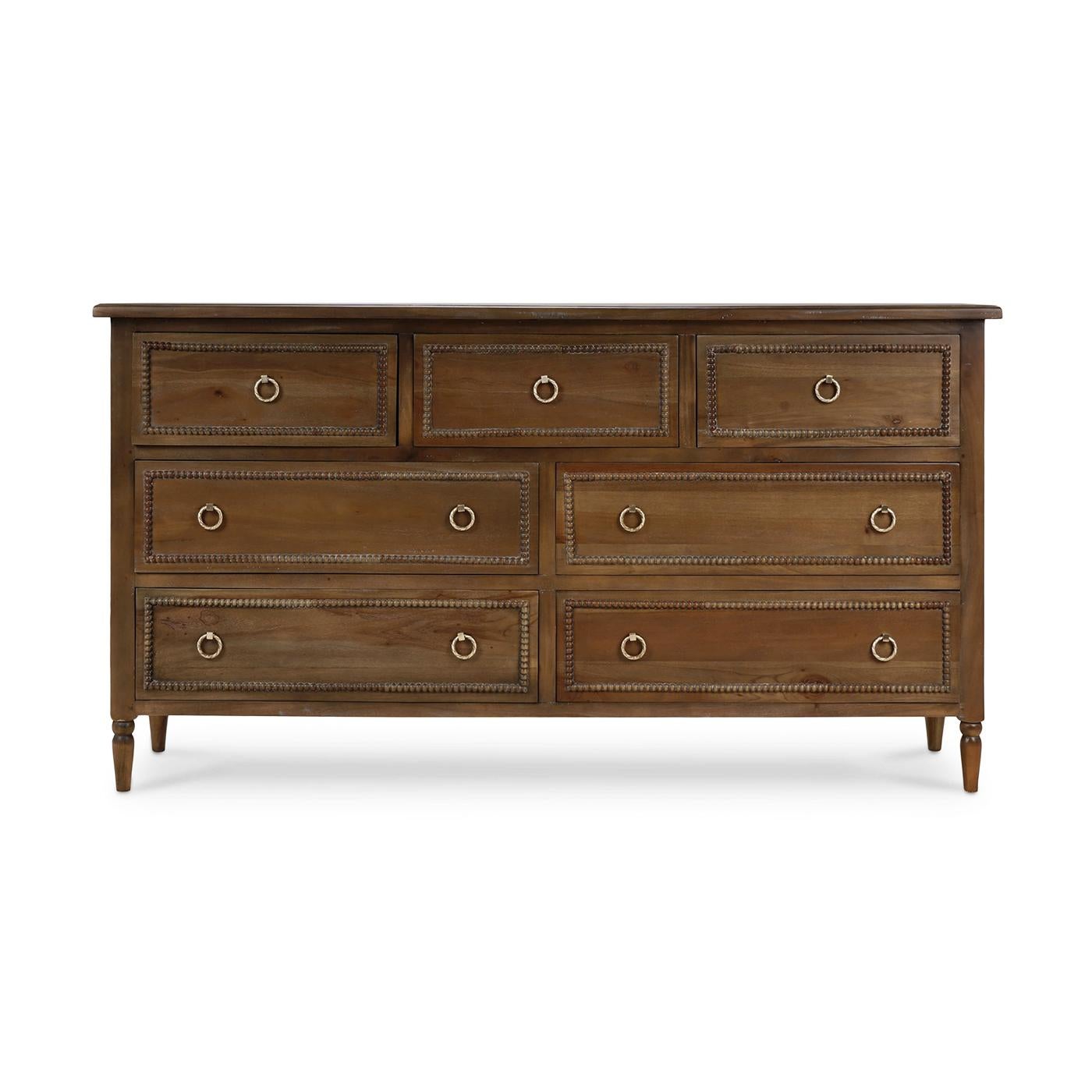 (A newly made reproduction) 
This beautifully crafted piece features a warm straw wash that complements any decor style. The delicate ring pulls add a hint of sophistication, making this chest a perfect addition to both traditional and contemporary