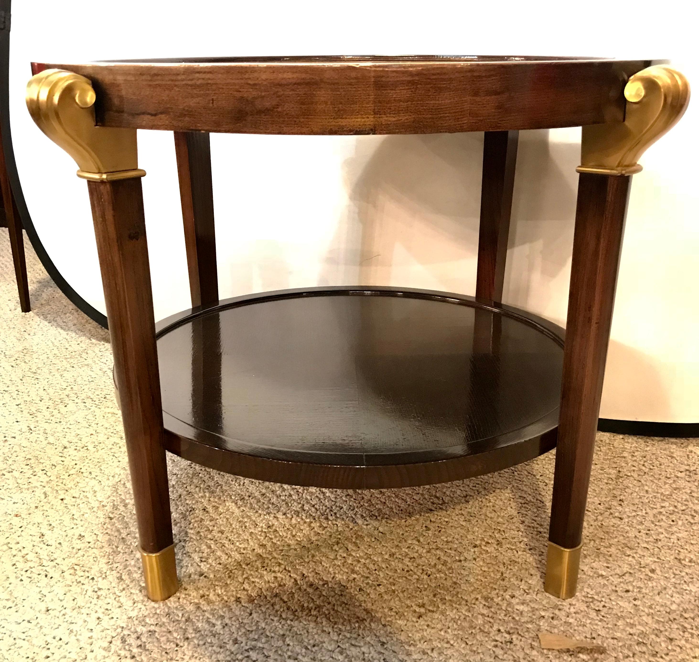 A mahogany reverse painted glass top centre, end or coffee table. Art Nouveau in form this fine custom quality centre table has bronze feet and terminate in bronze capitals. The top glass having a abstract floral reverse painted design on a gilt