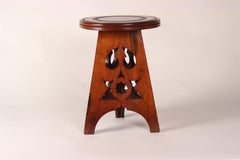 Mahogany Arts and Crafts Side Table with Turned Circular Top and Fretwork Panels